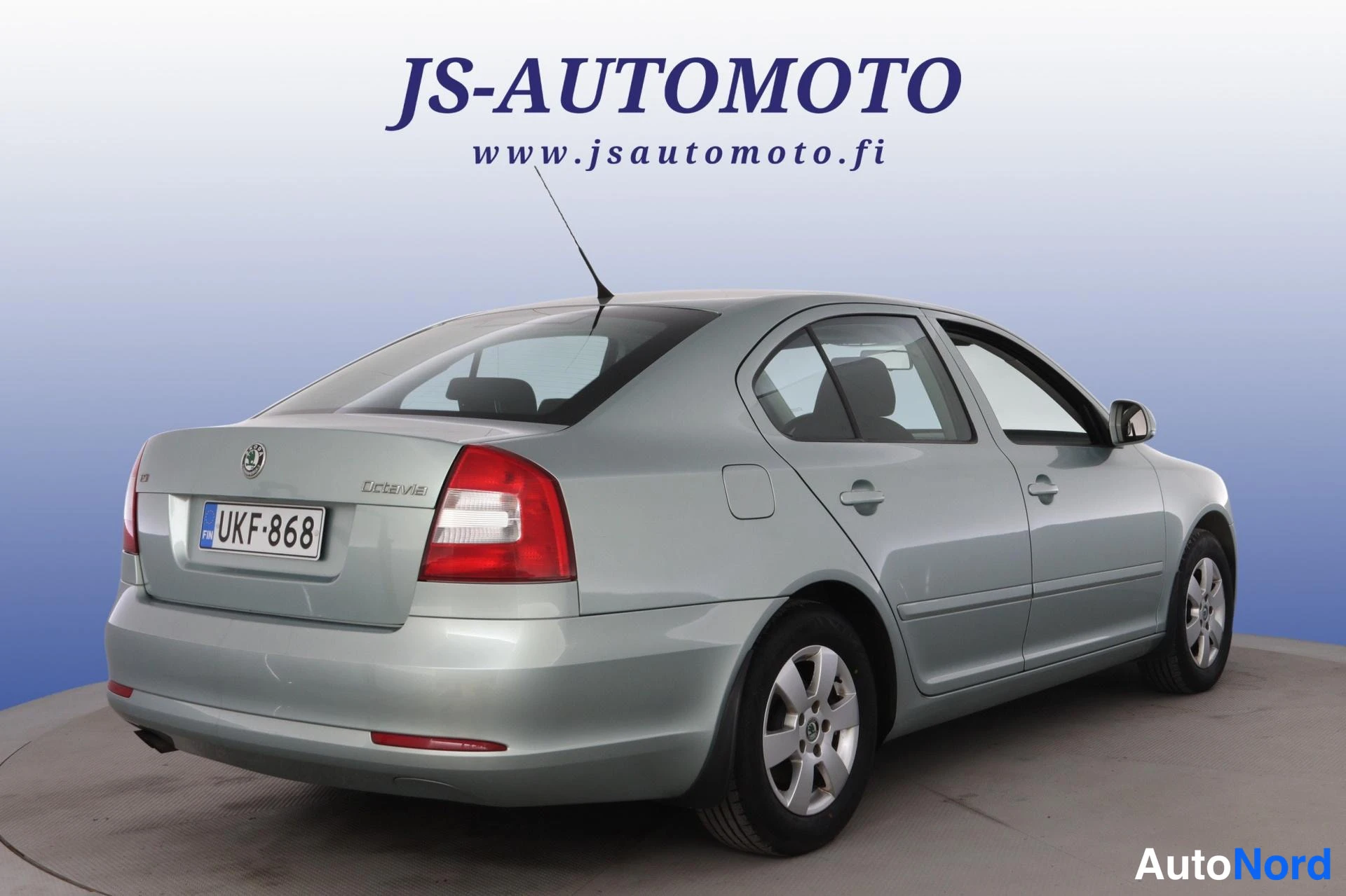 Vihreä Skoda Octavia 2010, takaviisto, kuva 5