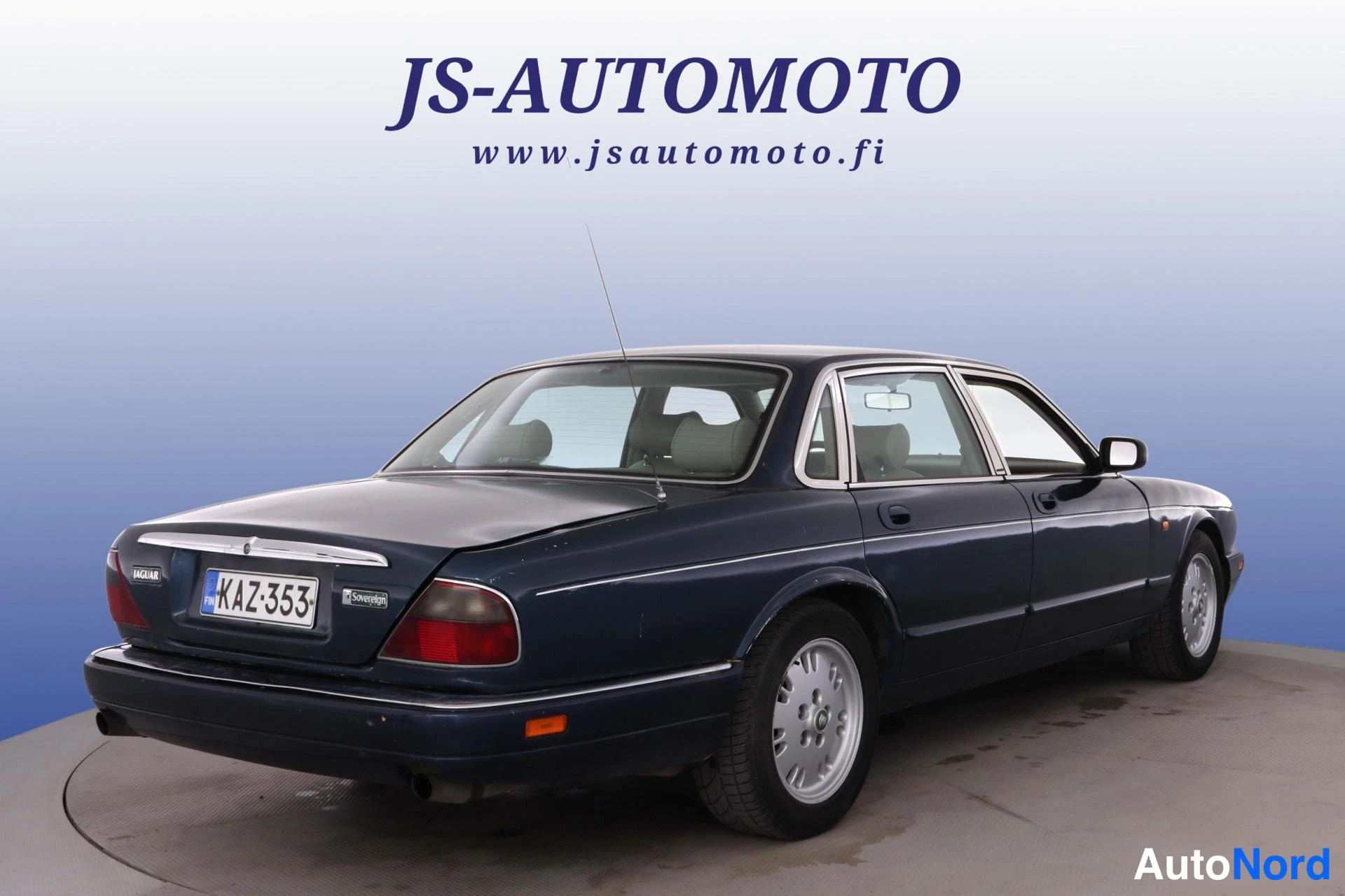Sininen Jaguar XJ6 1996, takaviisto, kuva 5