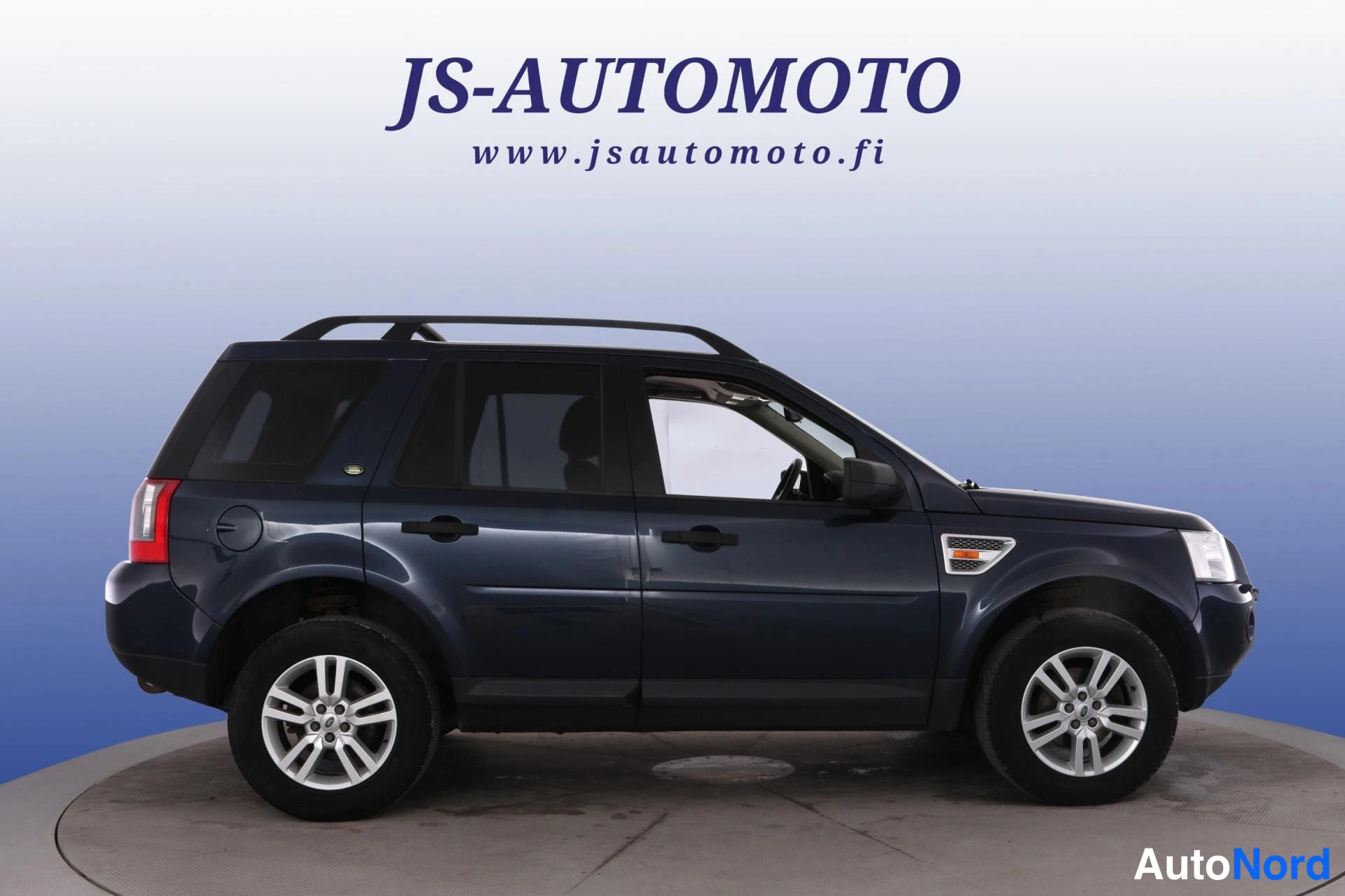 Blå Land Rover Freelander 2007, snett framifrån, fronten åt höger, bild 3