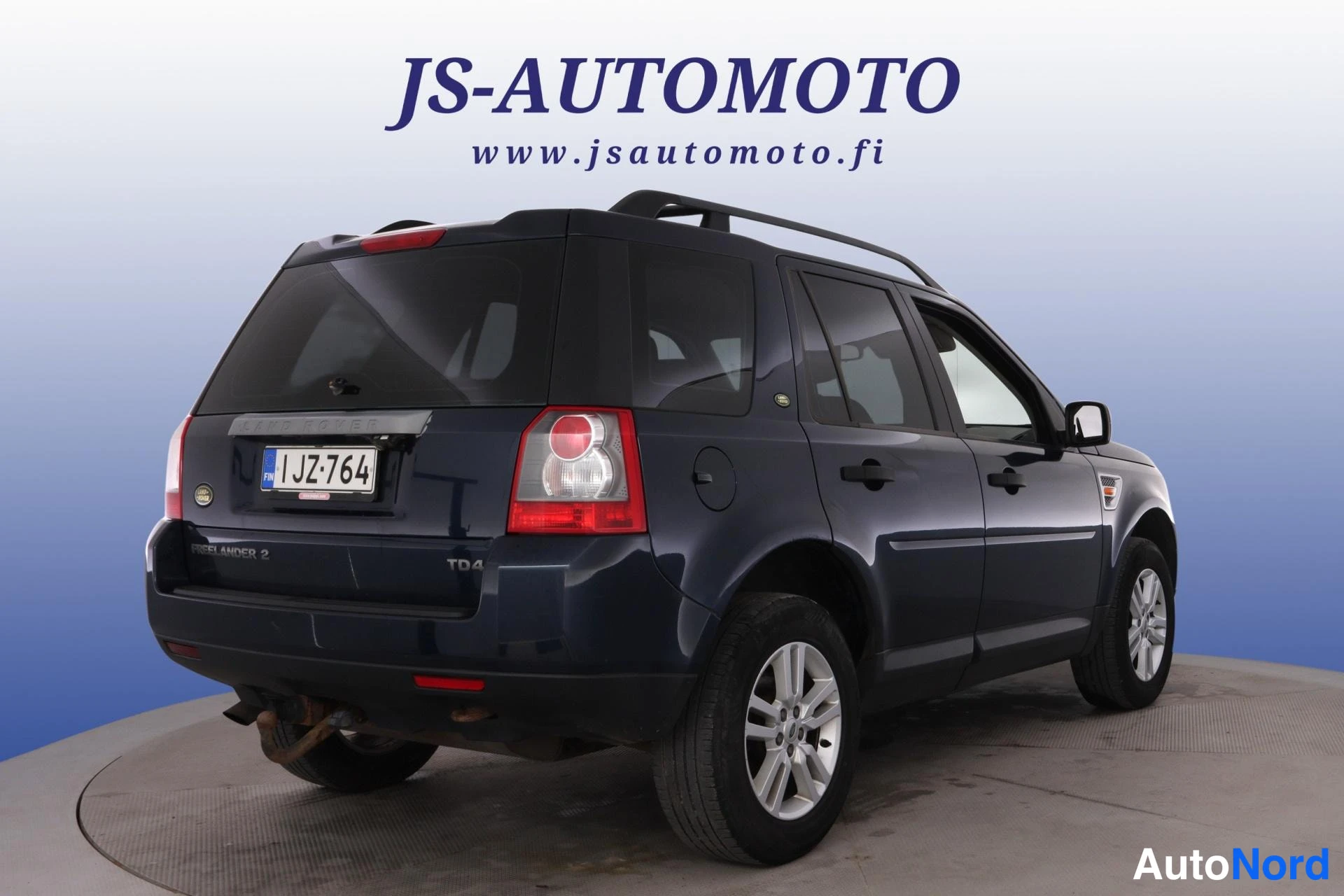 Blå Land Rover Freelander 2007, snett bakifrån, bild 5