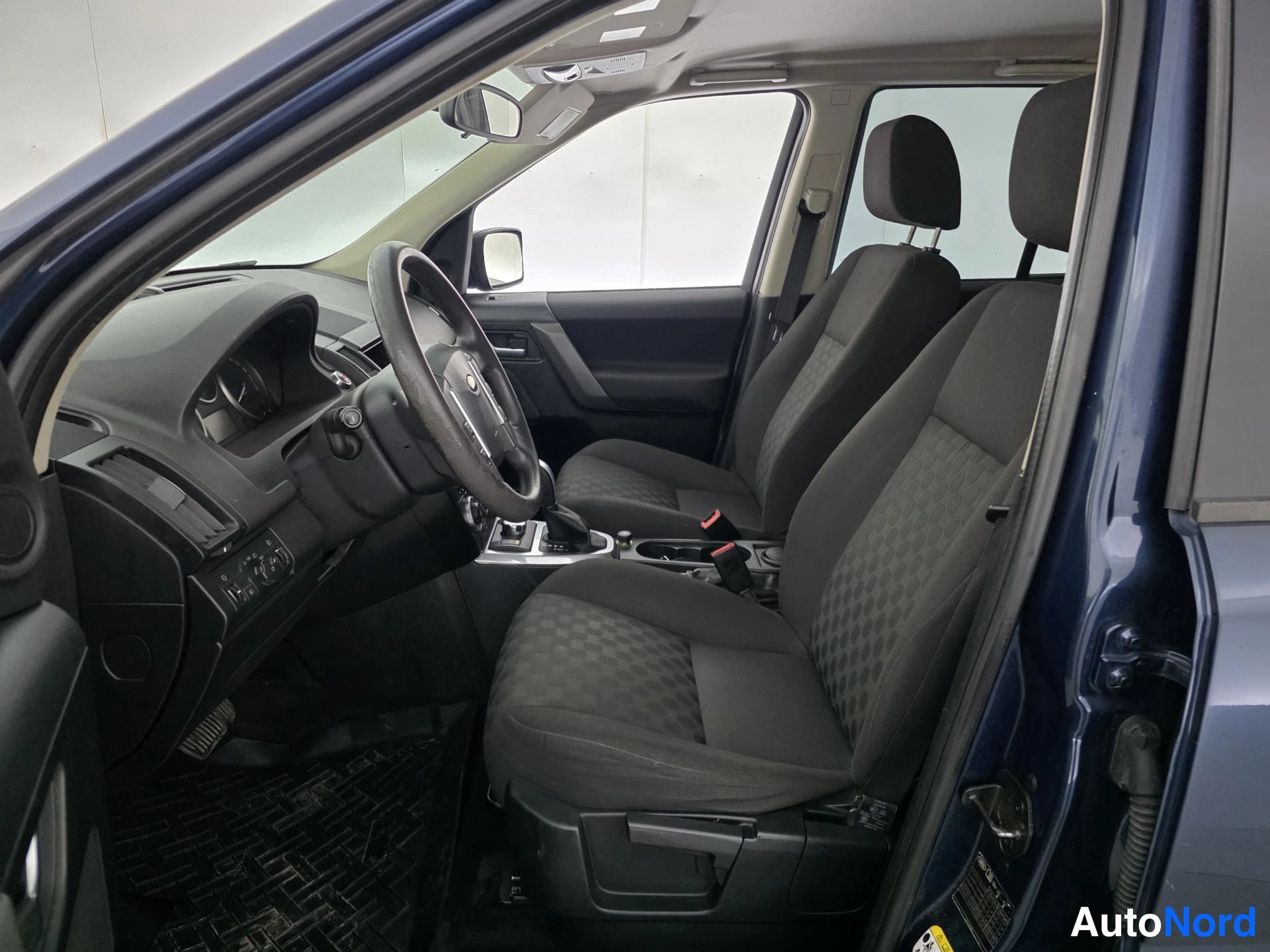 Blå Land Rover Freelander 2007, förarplats, bild 8