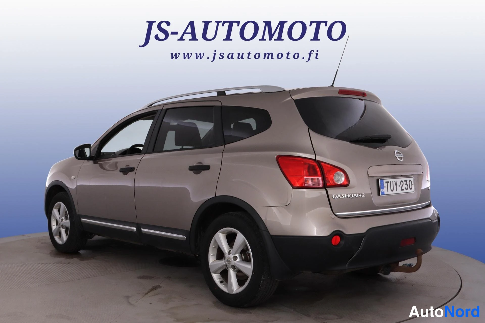 Ruskea Nissan Qashqai+2 2009, takaviisto, kuva 6