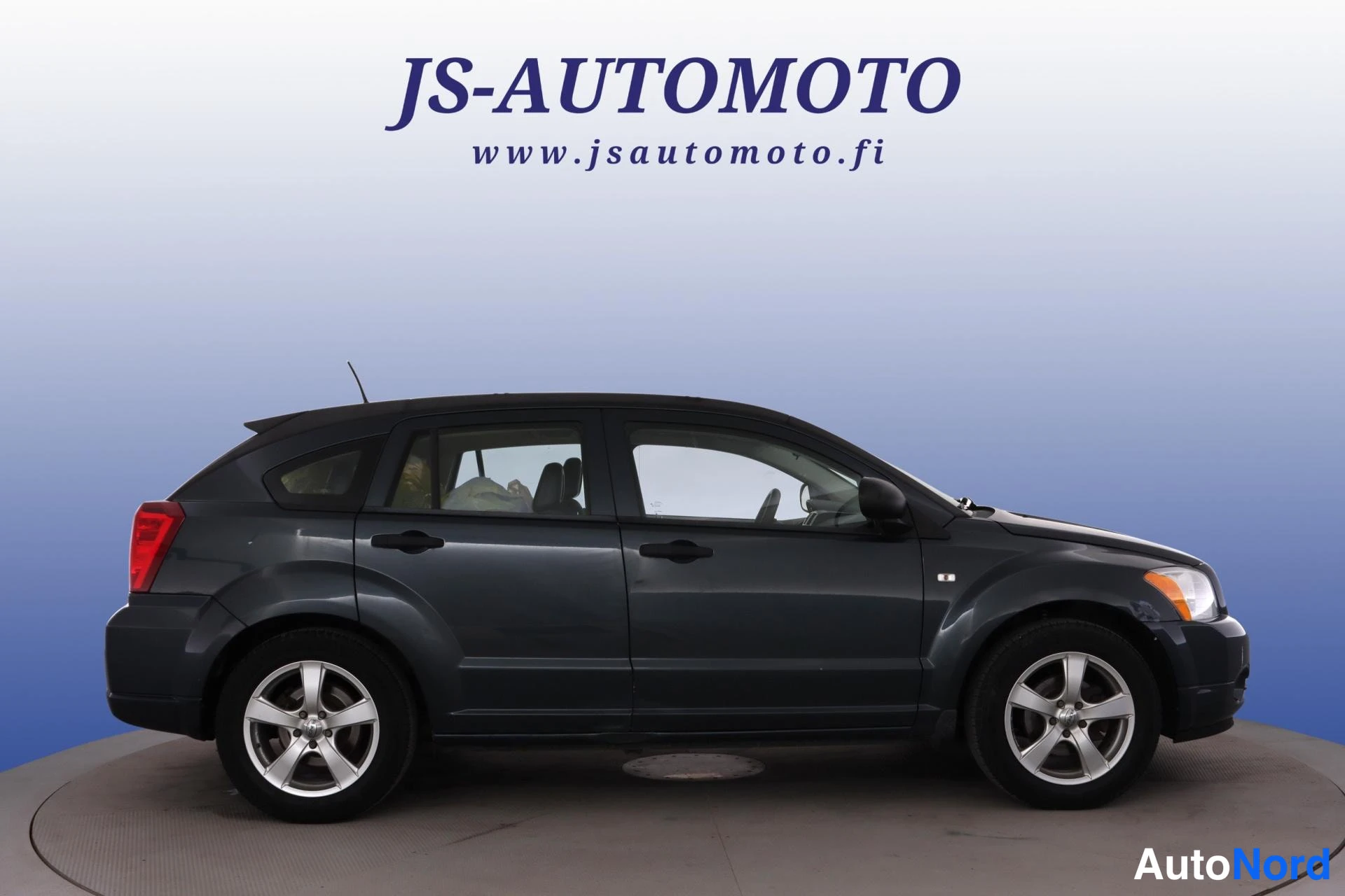 Blå Dodge Caliber 2008, från sidan, bild 4