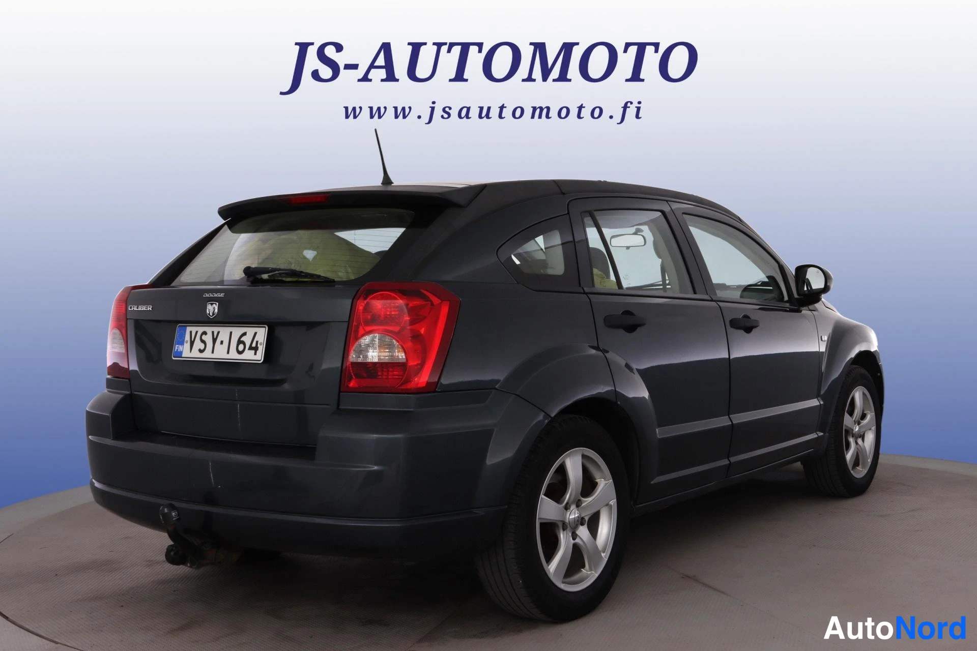 Blå Dodge Caliber 2008, snett bakifrån, bild 5