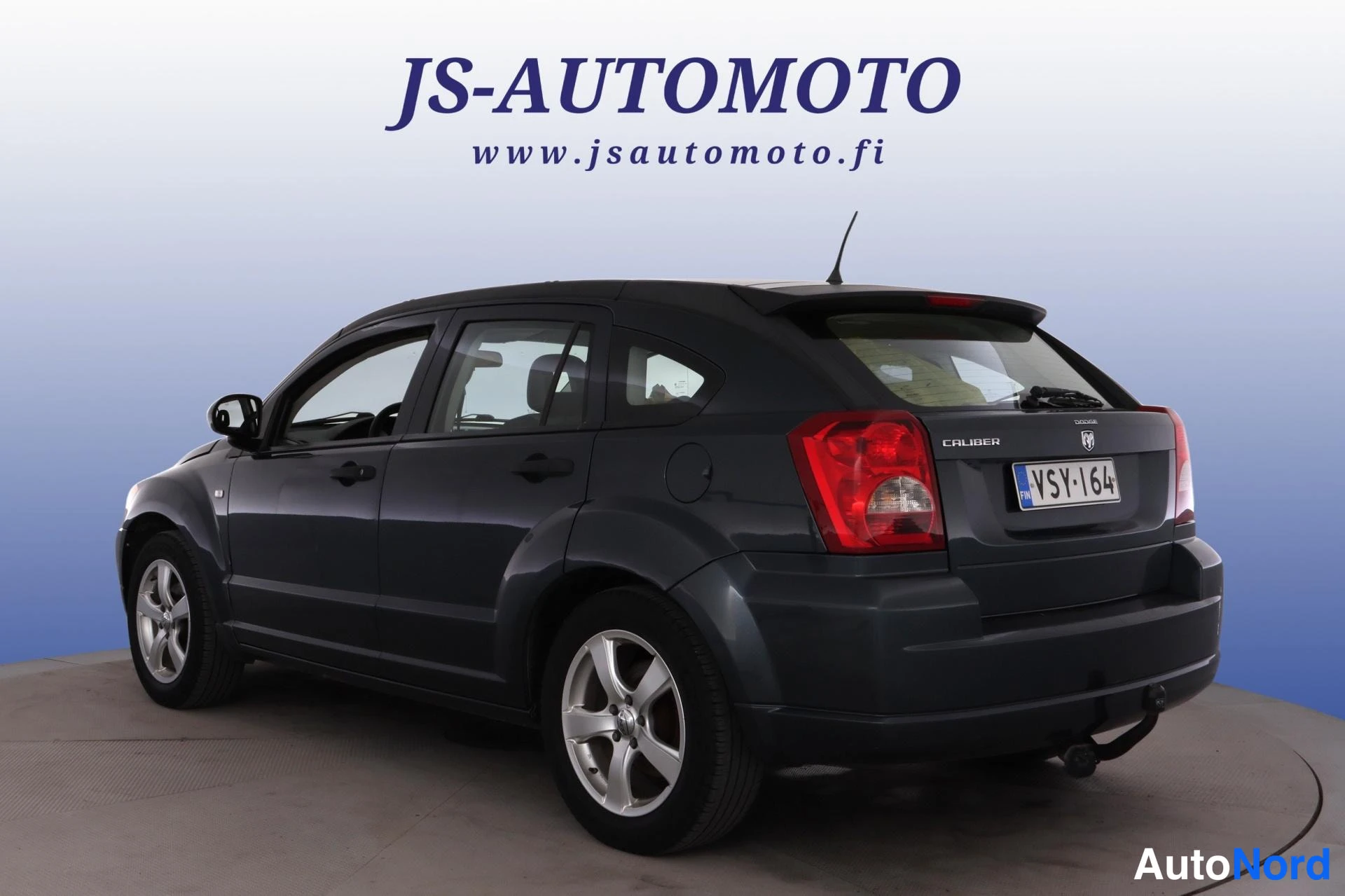 Blå Dodge Caliber 2008, snett bakifrån, bild 6