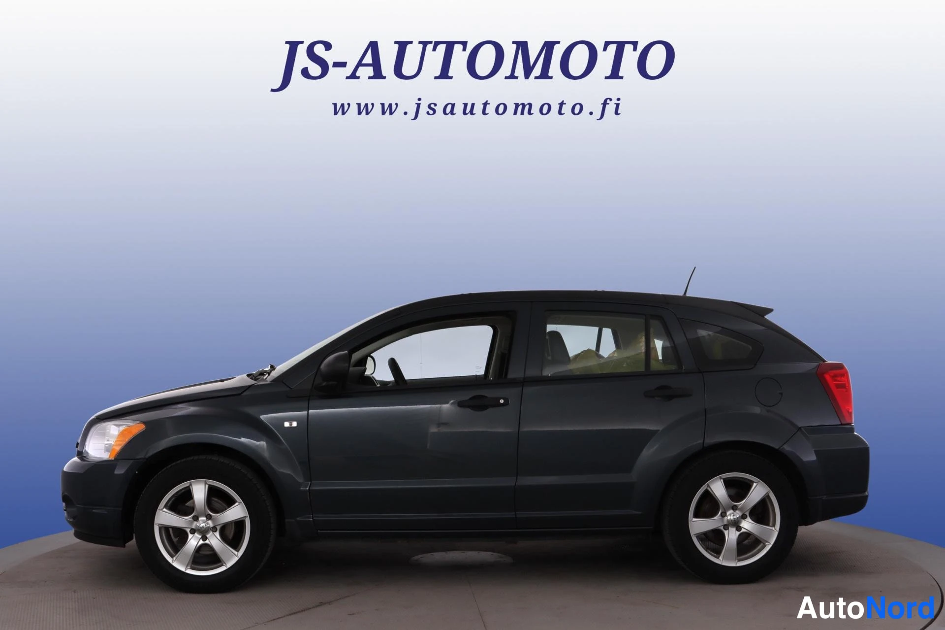 Blå Dodge Caliber 2008, snett framifrån, fronten åt vänster, bild 2