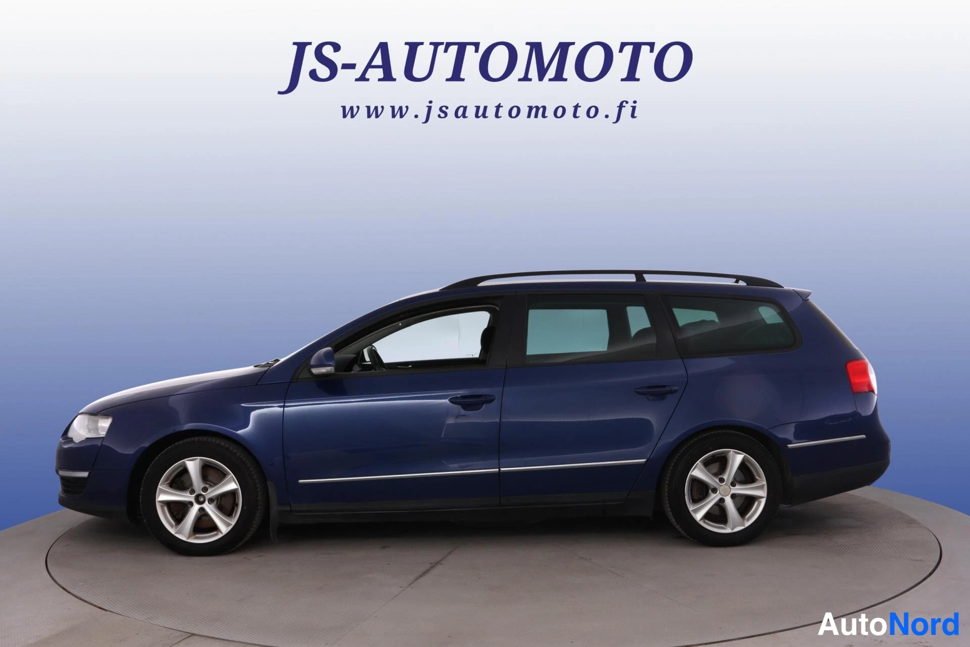 Sininen Volkswagen Passat 2007, etuviisto, keula vasemmalle, kuva 2
