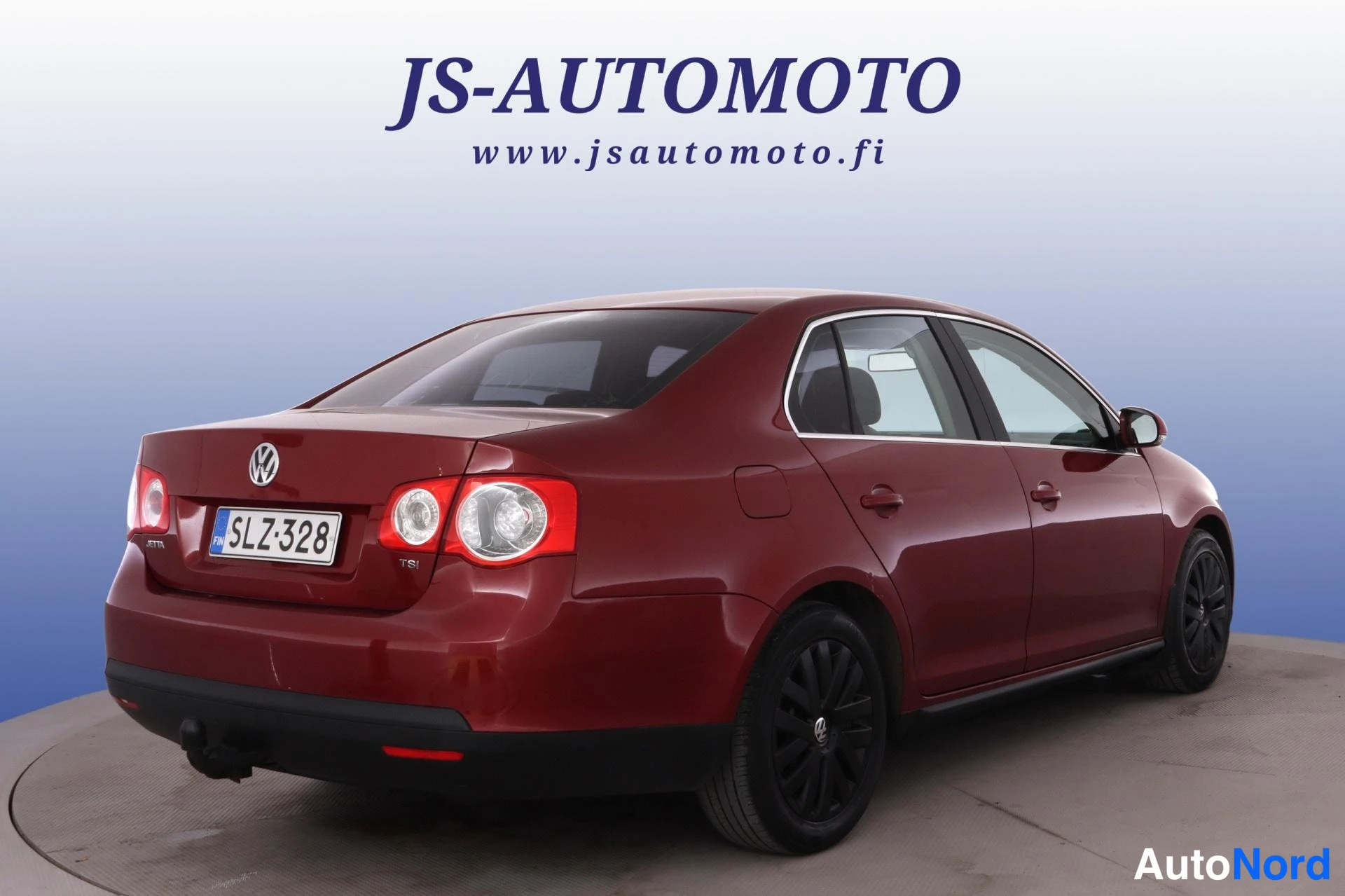 Punainen Volkswagen Jetta 2010, takaviisto, kuva 5