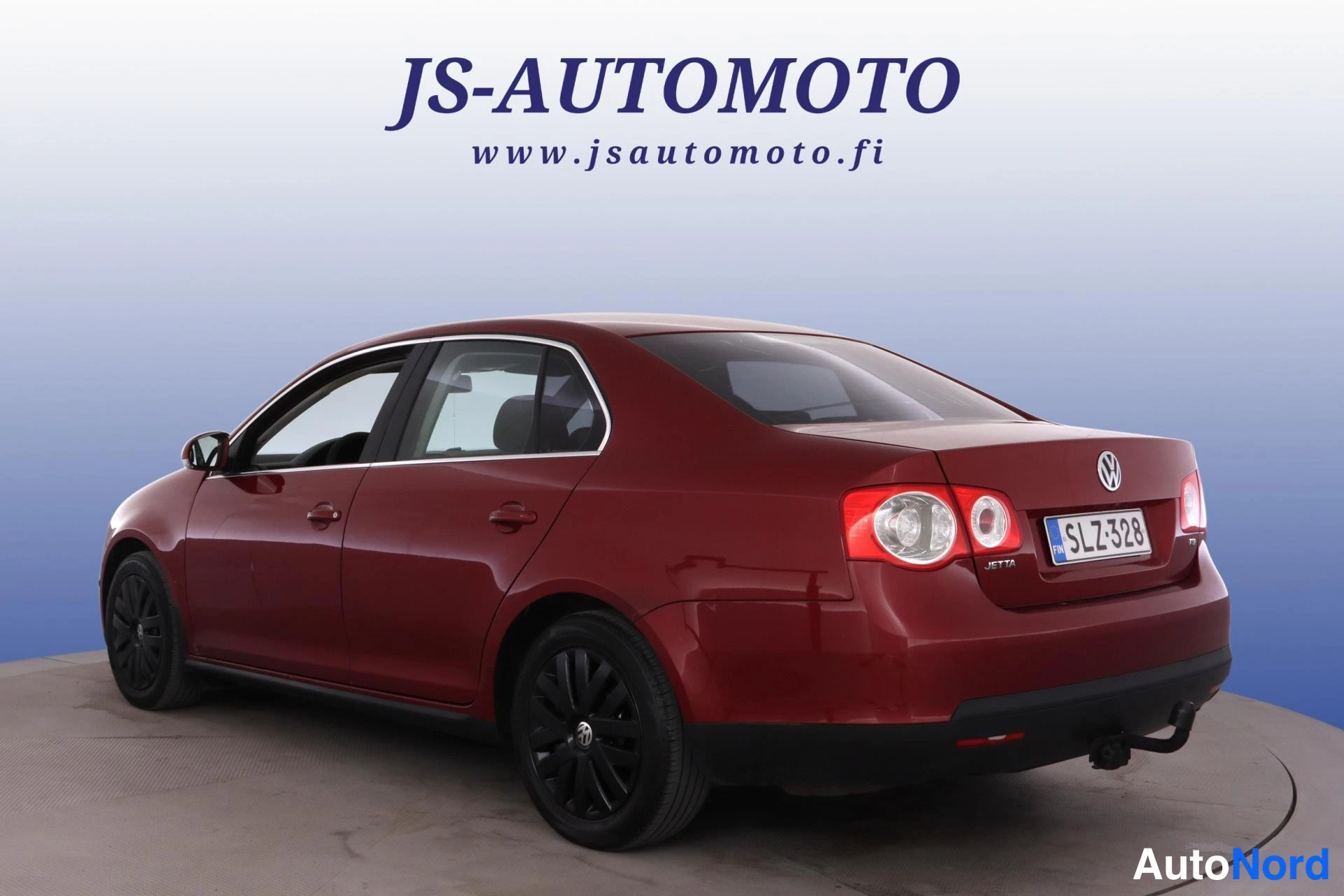 Punainen Volkswagen Jetta 2010, takaviisto, kuva 6