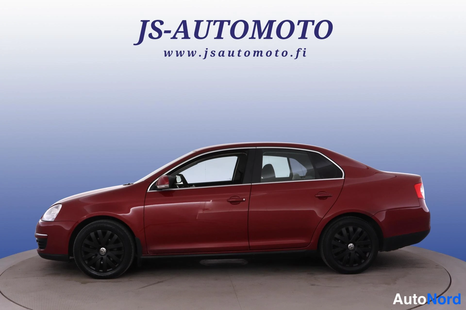 Punainen Volkswagen Jetta 2010, etuviisto, keula vasemmalle, kuva 2