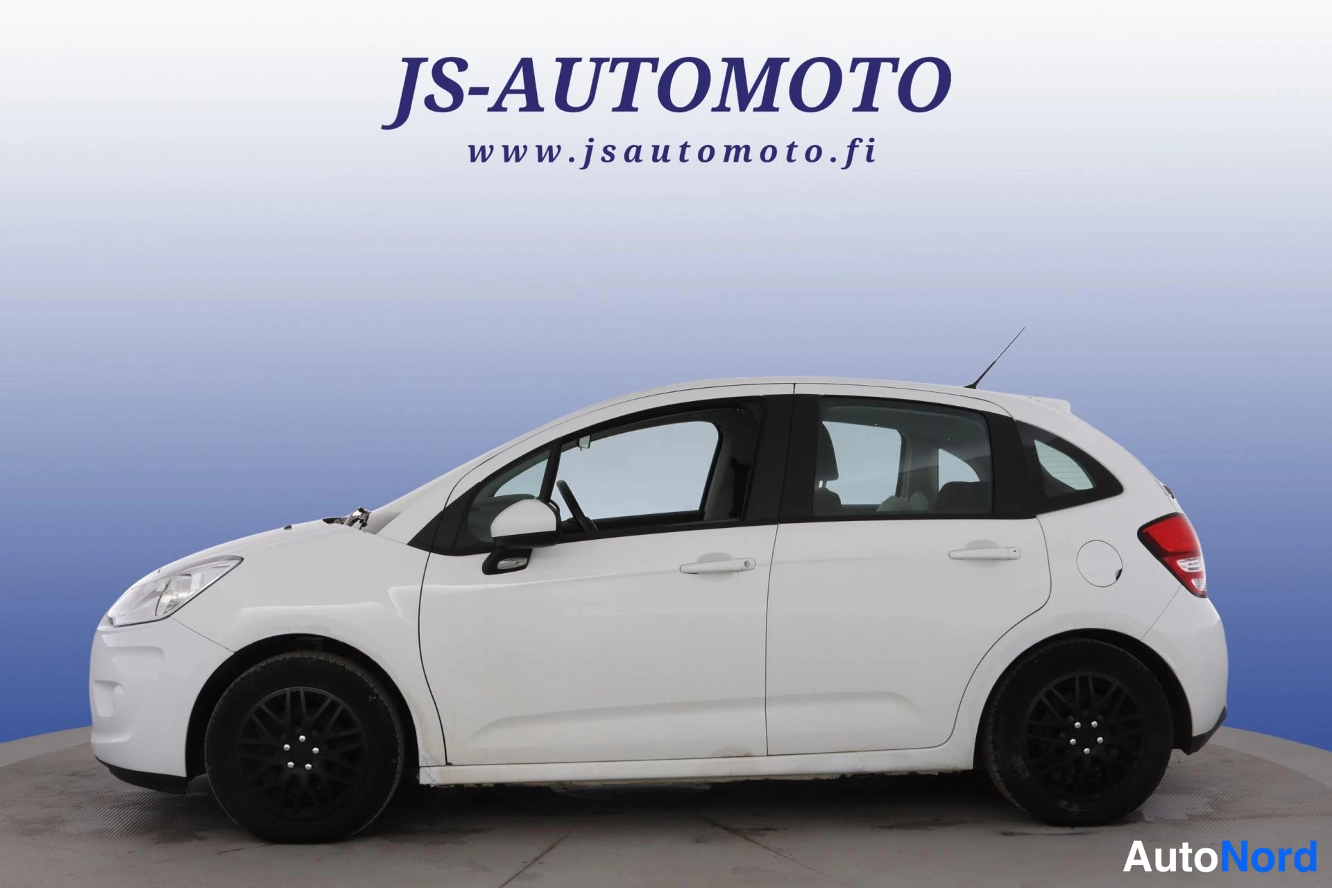 Valkoinen Citroen C3 2010, etuviisto, keula vasemmalle, kuva 2