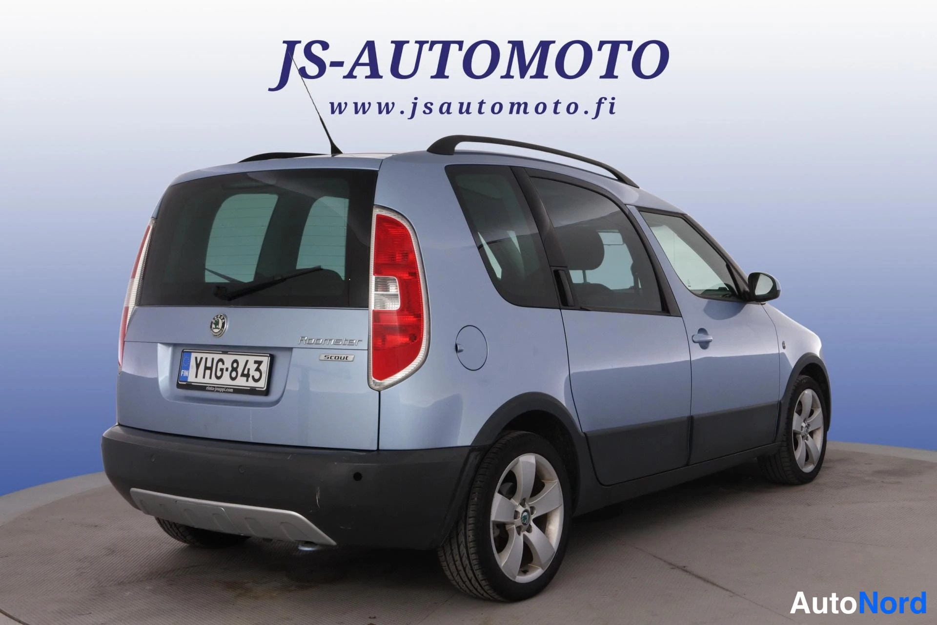 Blå Skoda Roomster 2008, snett bakifrån, bild 5
