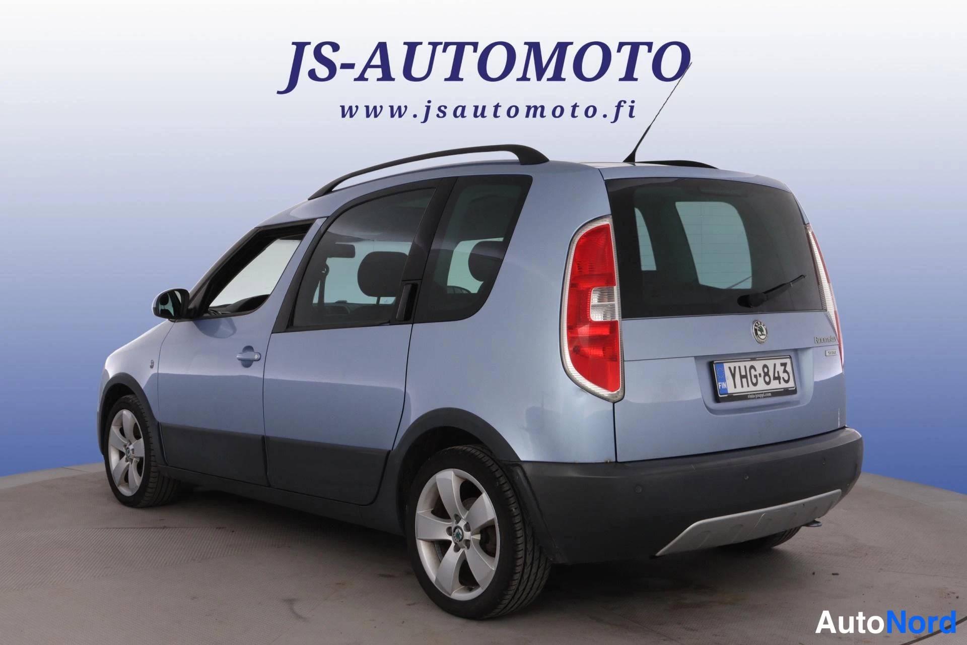 Blå Skoda Roomster 2008, snett bakifrån, bild 6