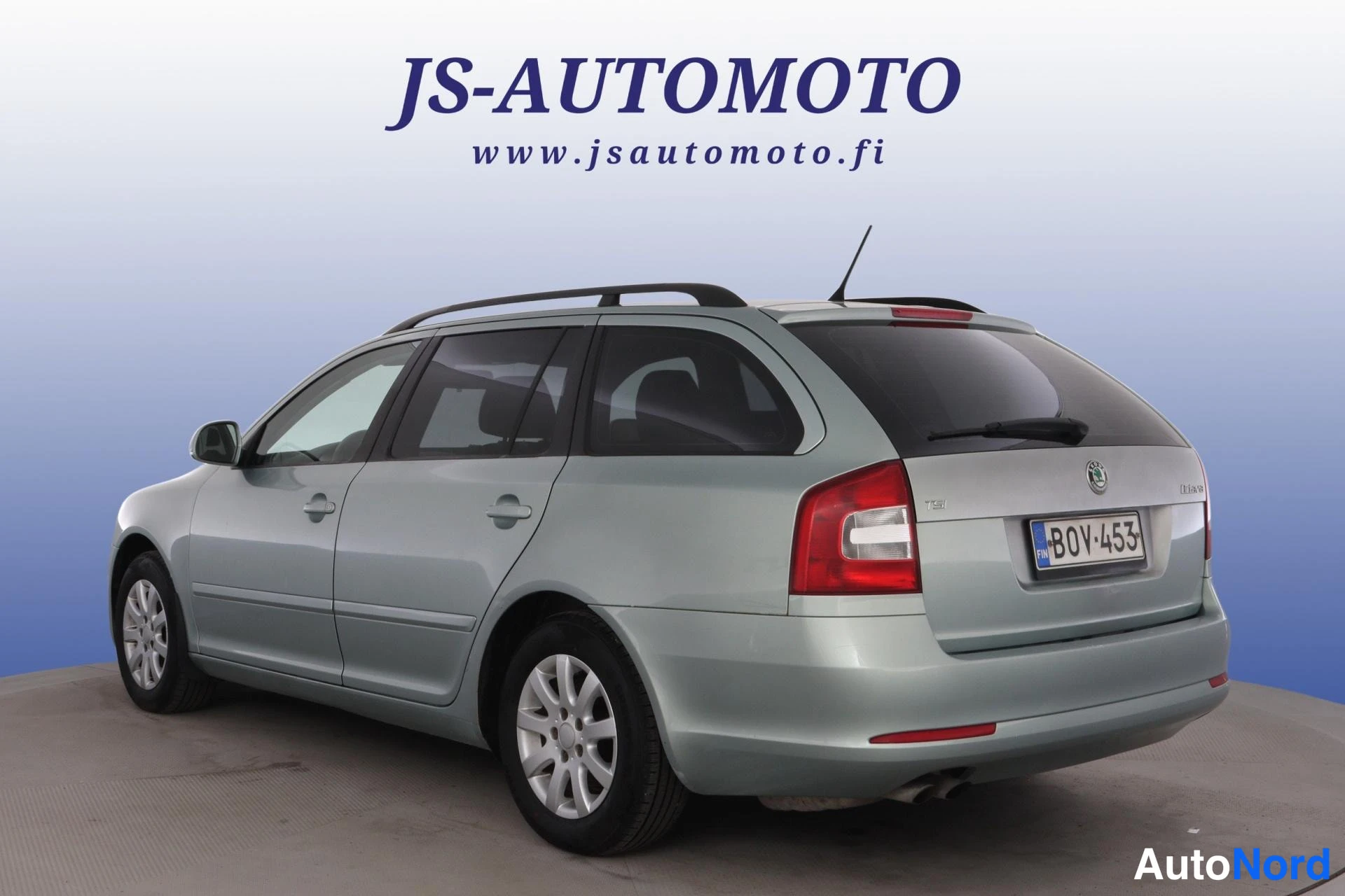 Vihreä Skoda Octavia 2011, takaviisto, kuva 6