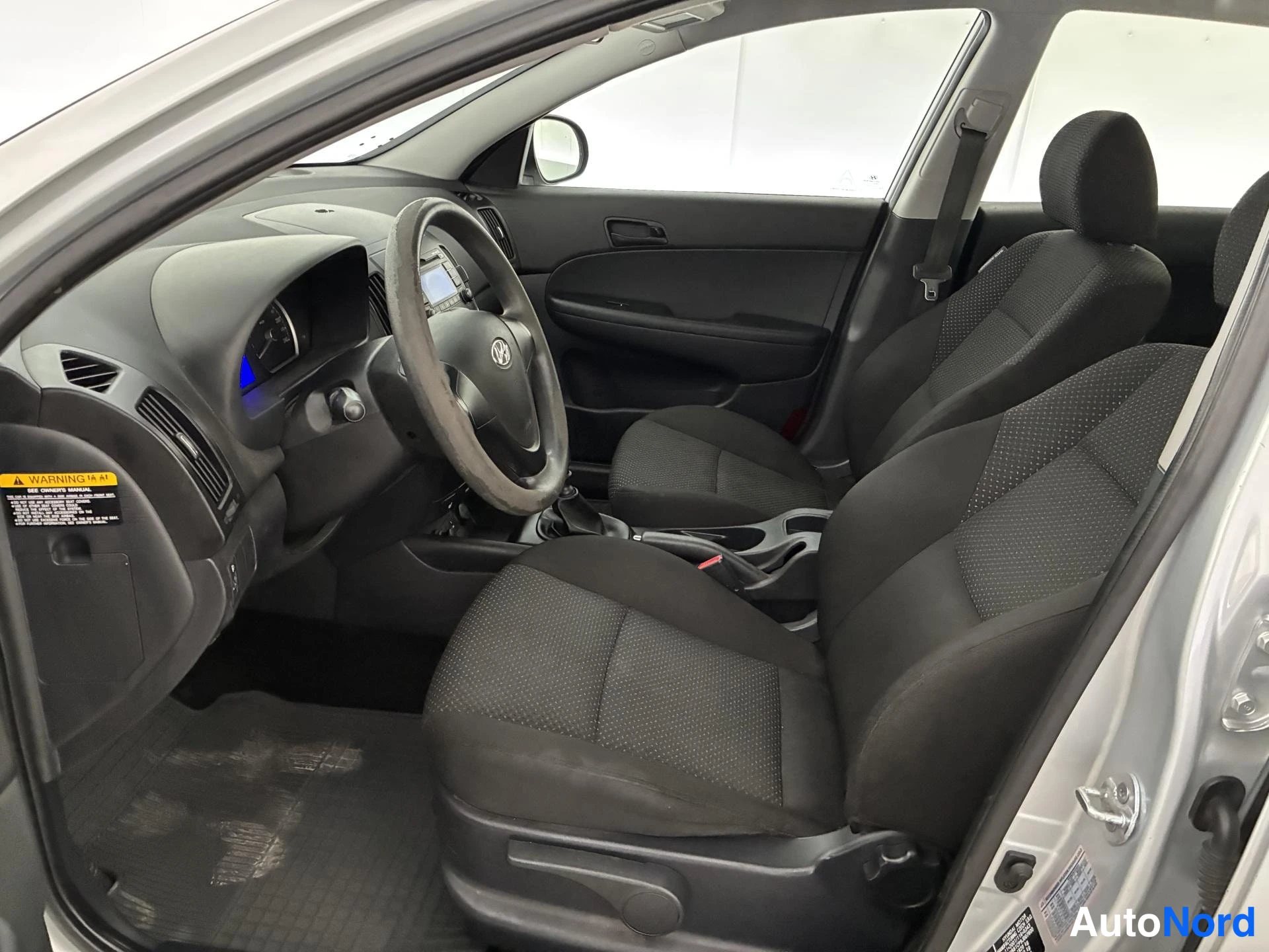 Silver Hyundai i30 2009, förarplats, bild 7