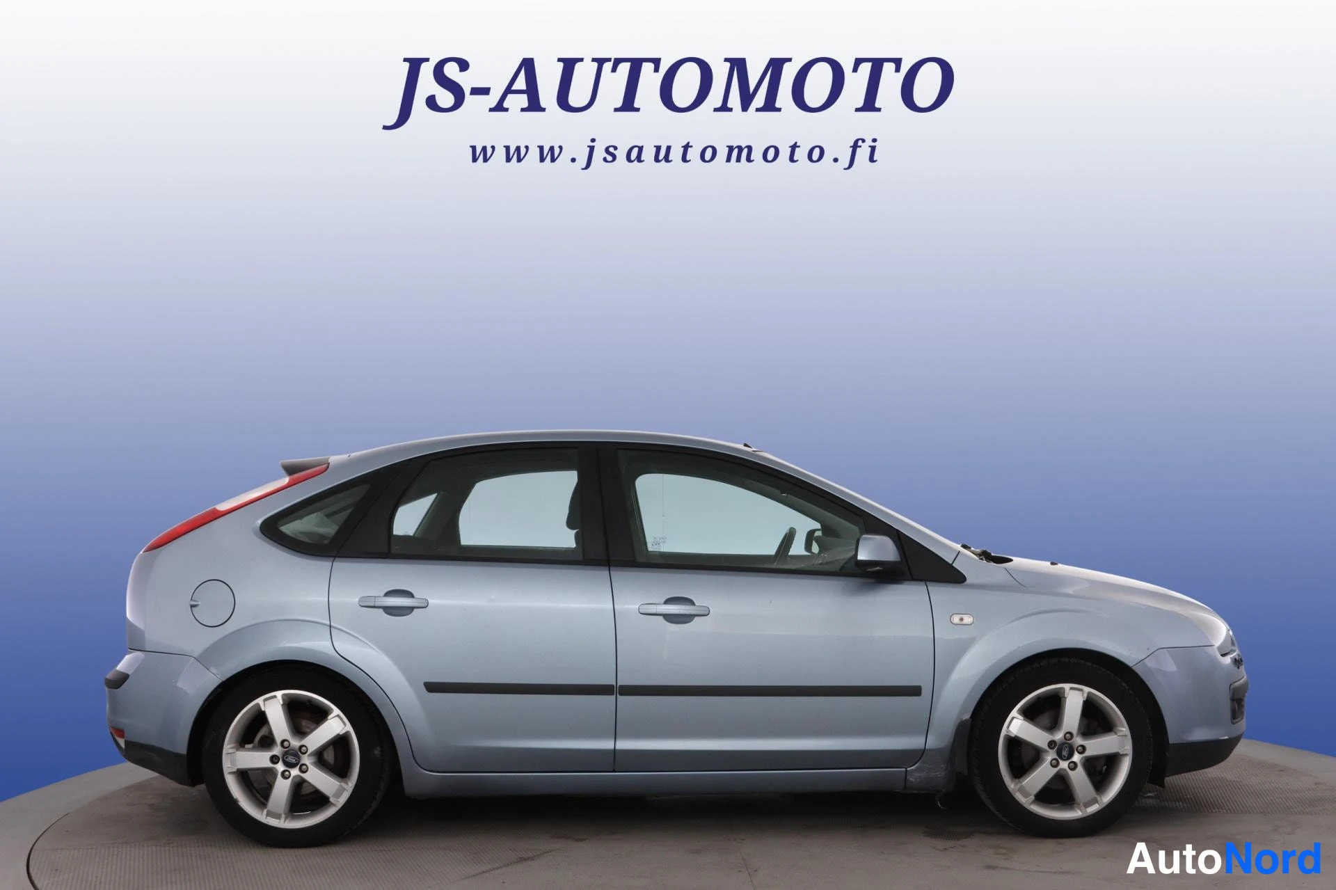 Sininen Ford Focus 2005, etuviisto, keula oikealle, kuva 3
