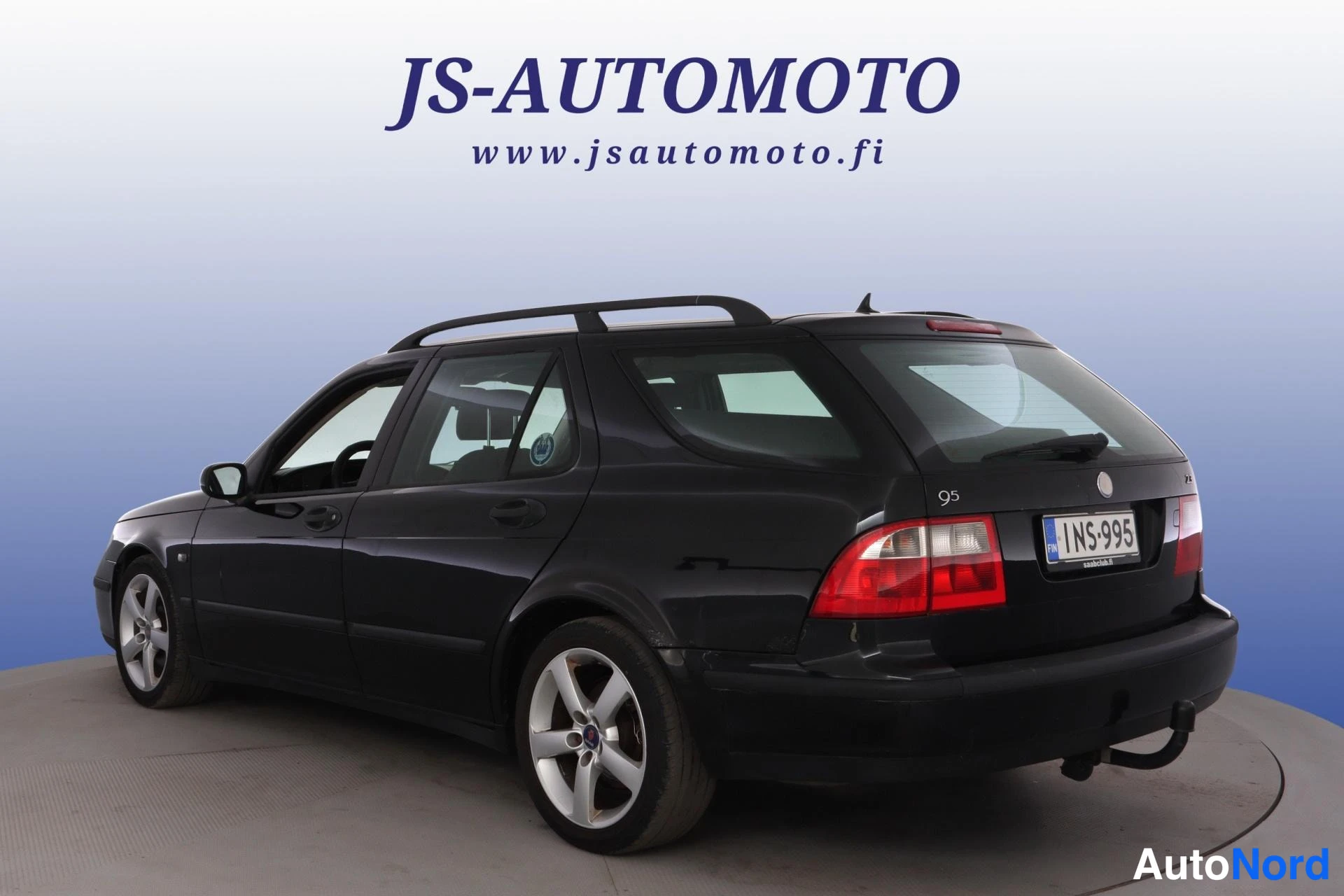 Svart Saab 9-5 2005, snett bakifrån, bild 6