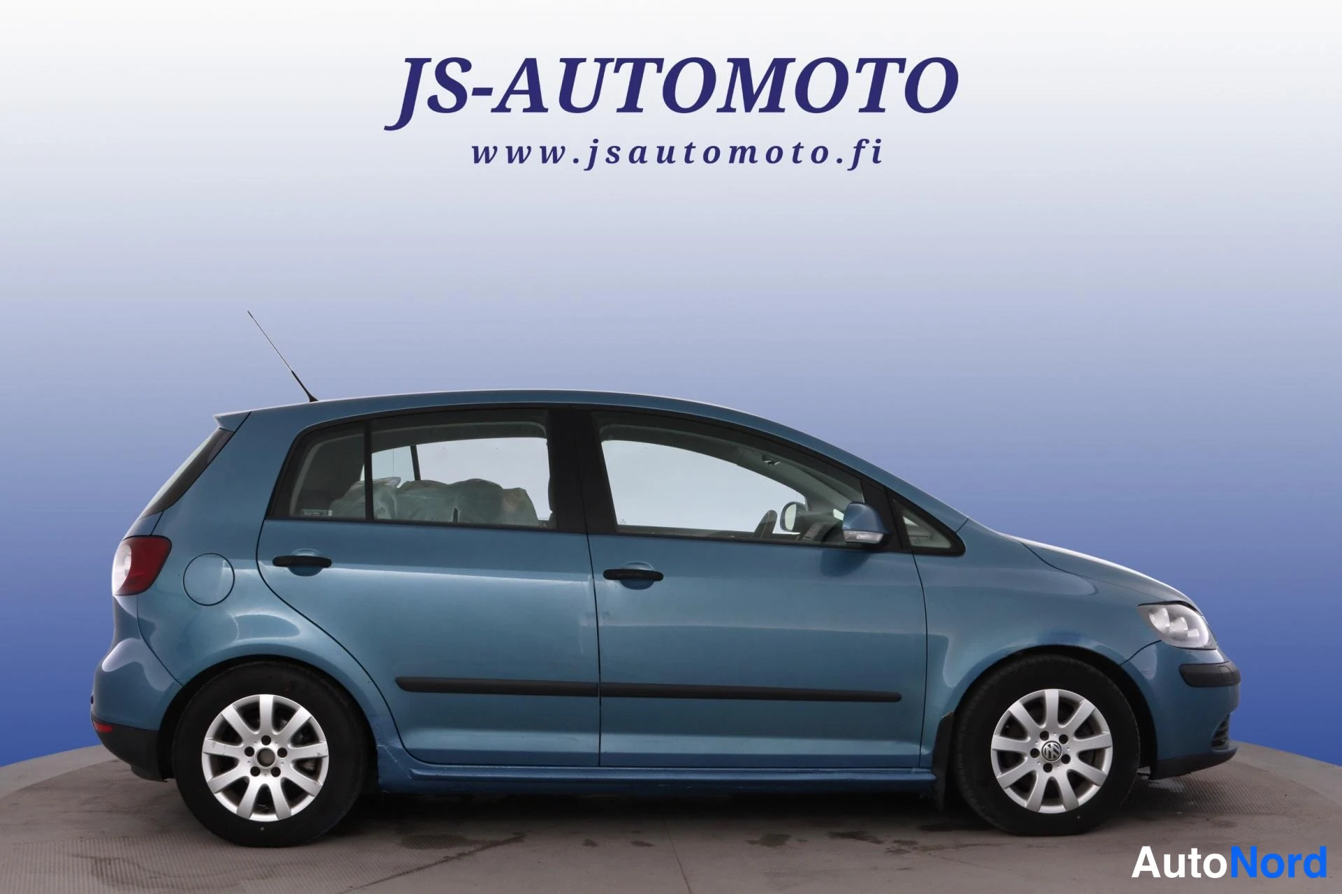 Sininen Volkswagen Golf Plus 2006, sivulta, kuva 3