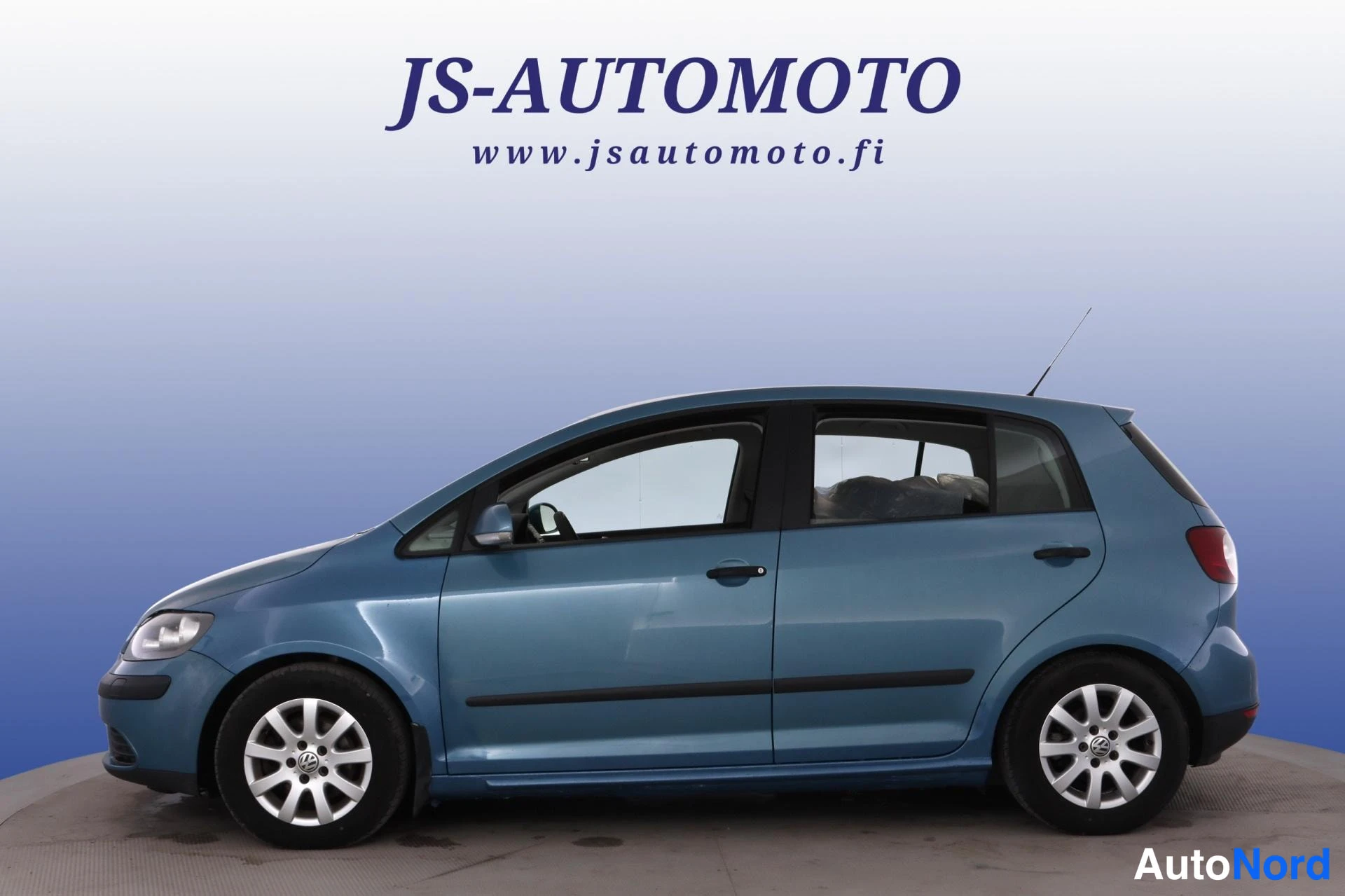 Sininen Volkswagen Golf Plus 2006, sivulta, kuva 4