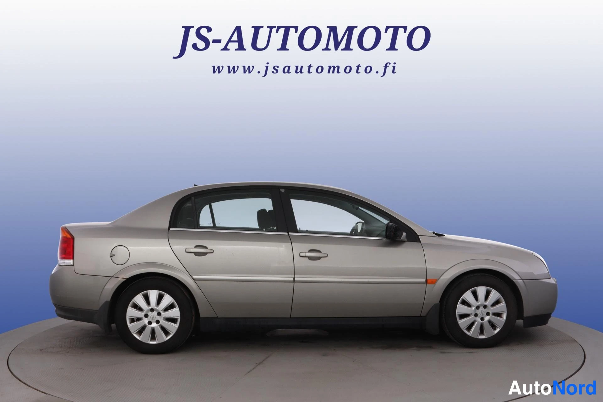 Grå Opel Vectra 2003, från sidan, bild 3