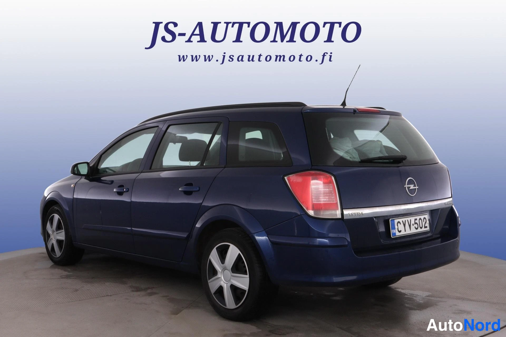 Sininen Opel Astra 2006, takaviisto, kuva 6