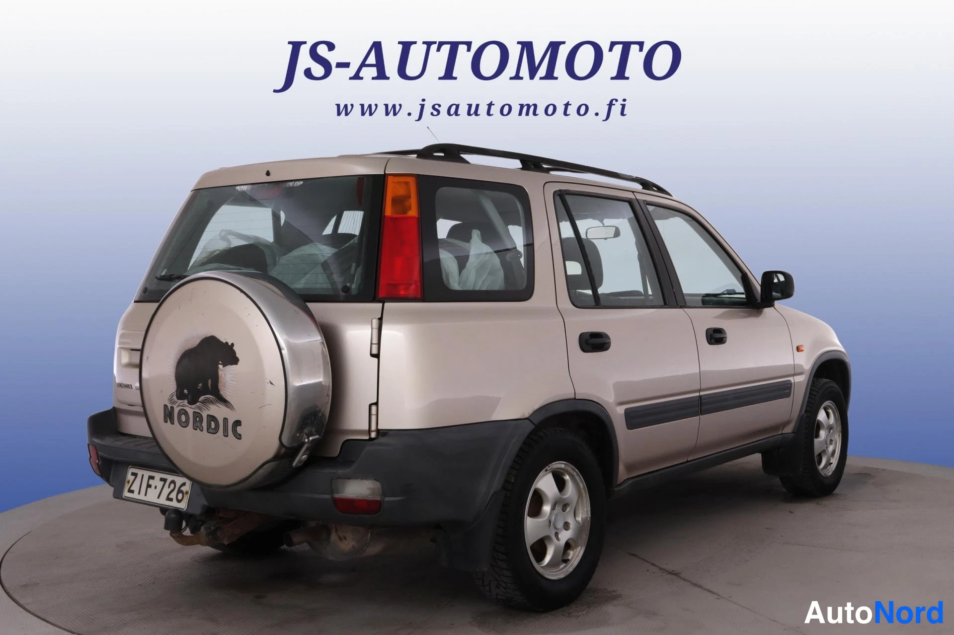 Beige Honda CR-V 1999, snett bakifrån, bild 5