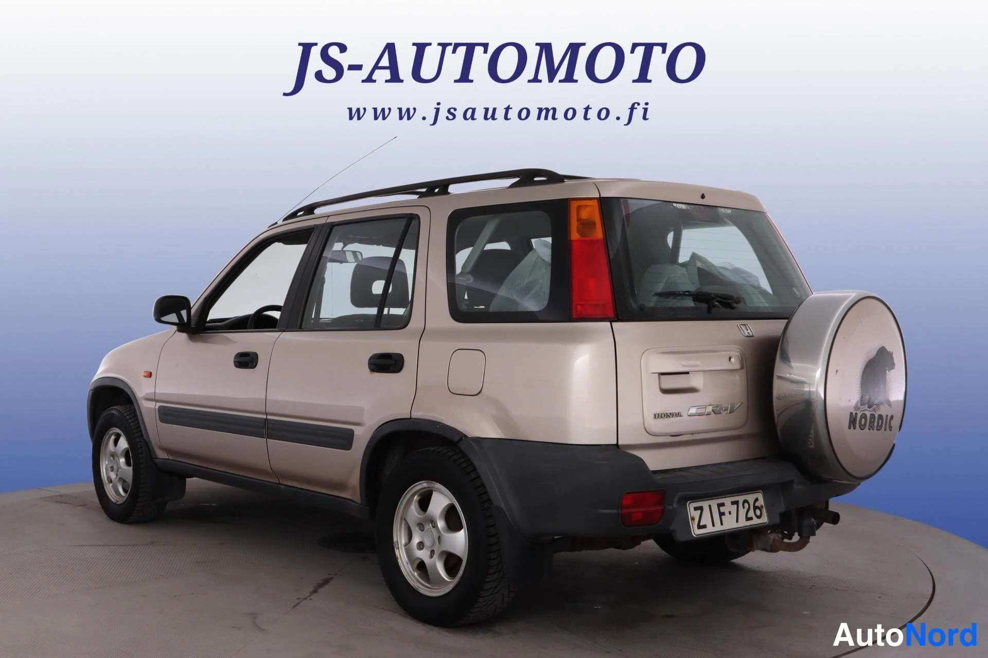Beige Honda CR-V 1999, snett bakifrån, bild 6