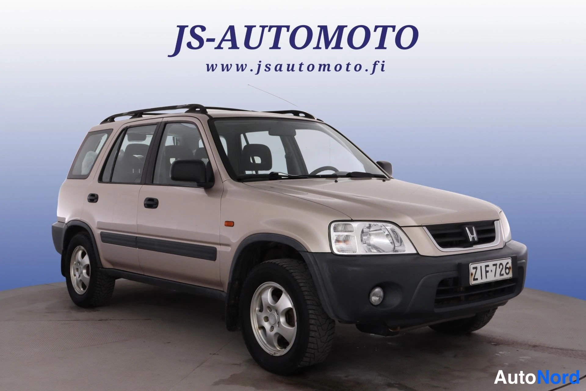 Beige Honda CR-V 1999, snett framifrån, fronten åt höger, bild 3