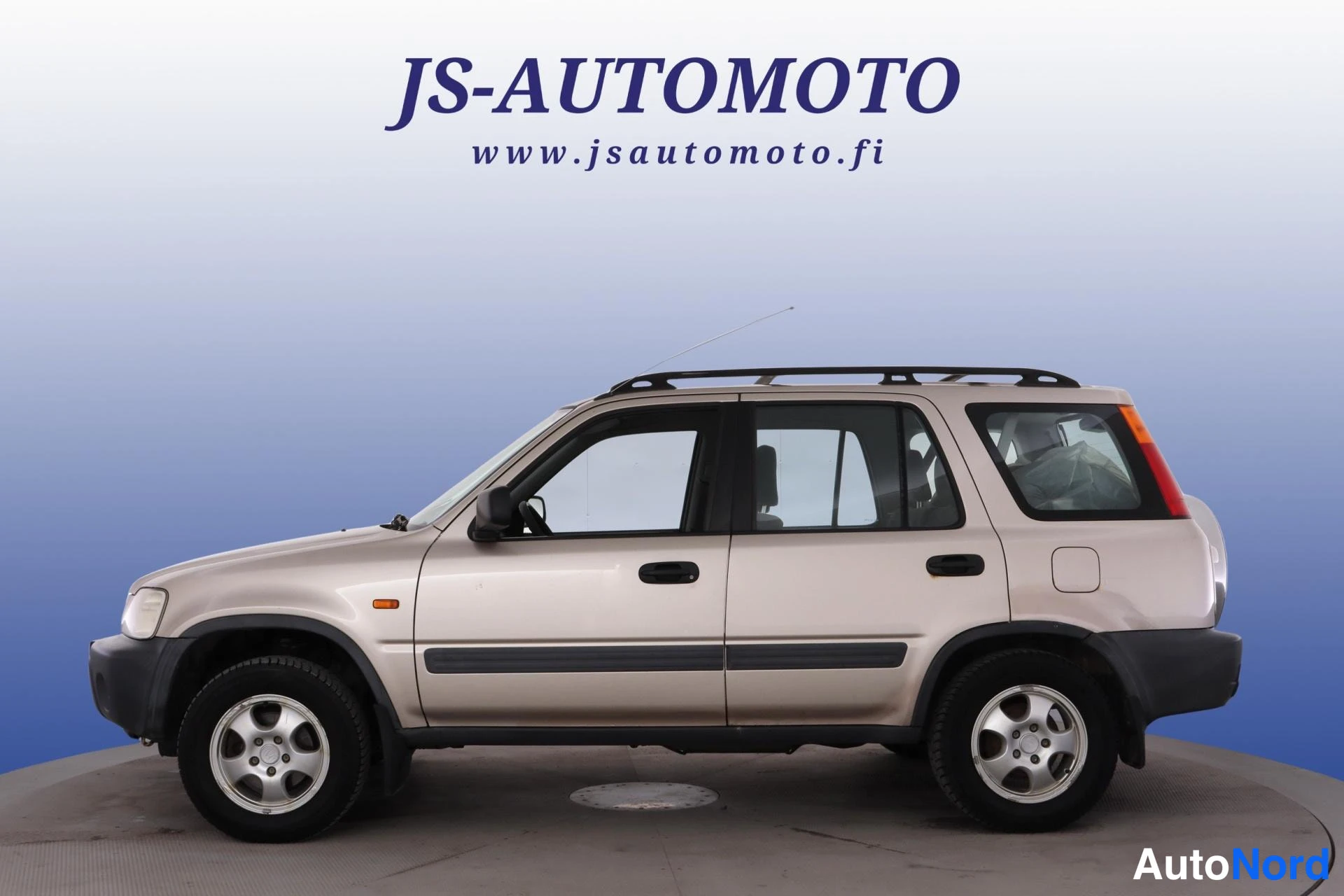 Beige Honda CR-V 1999, snett framifrån, fronten åt vänster, bild 2