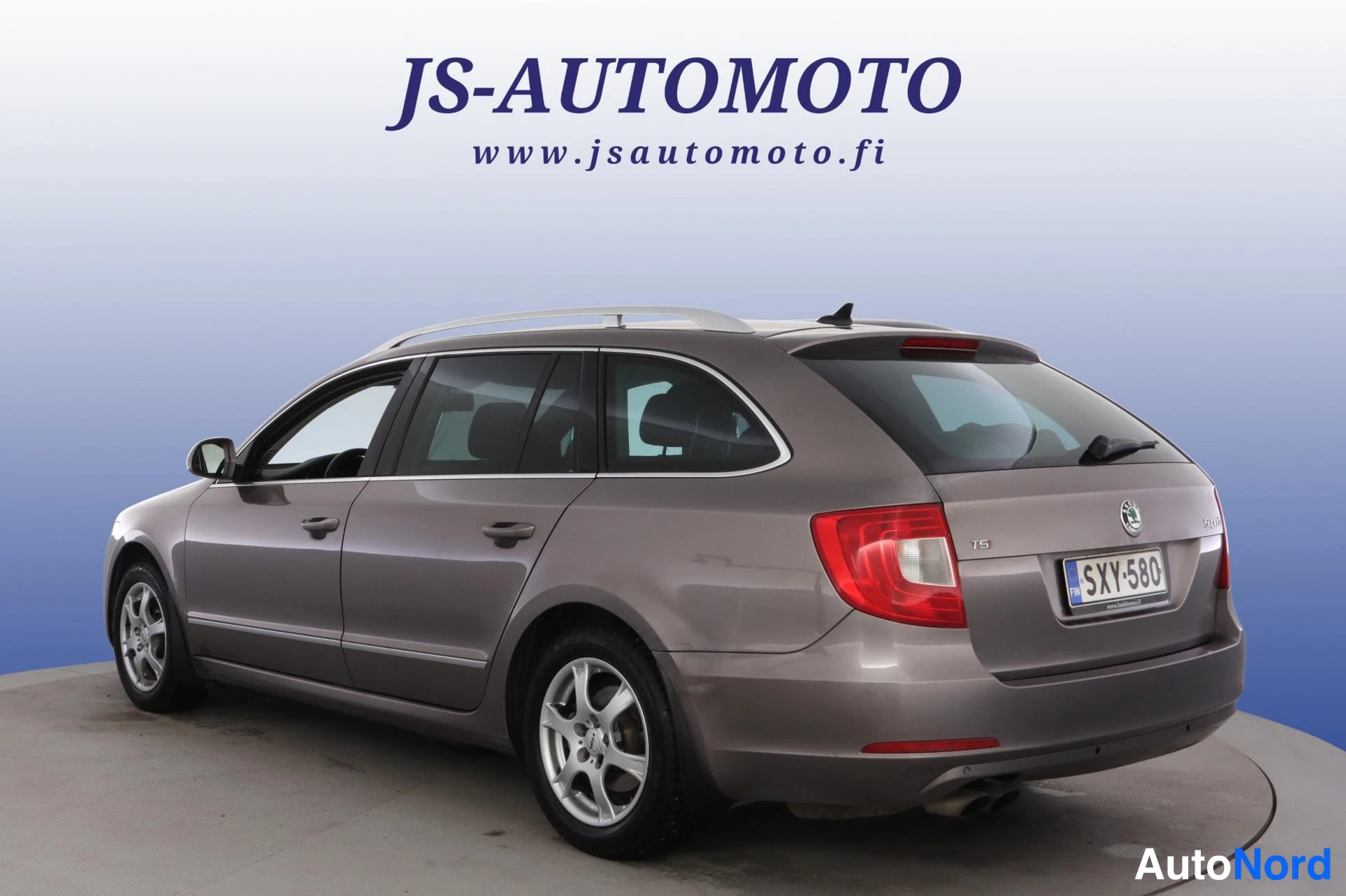Harmaa Skoda Superb 2010, takaviisto, kuva 6