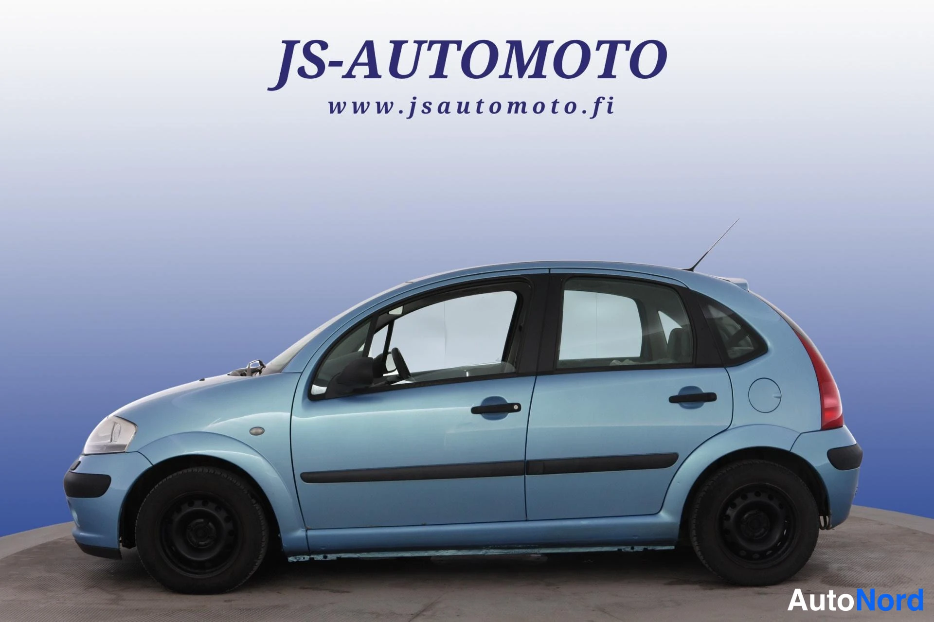 Sininen Citroen C3 2005, etuviisto, keula vasemmalle, kuva 2