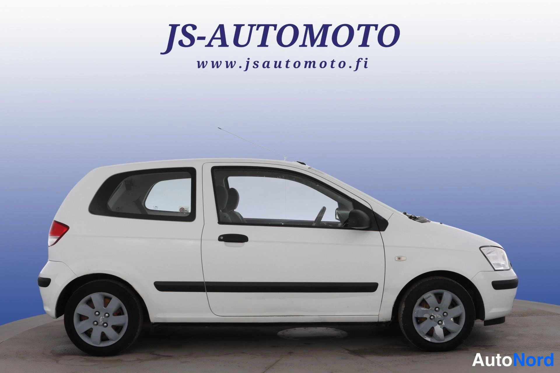 Valkoinen Hyundai Getz 2005, etuviisto, keula oikealle, kuva 3