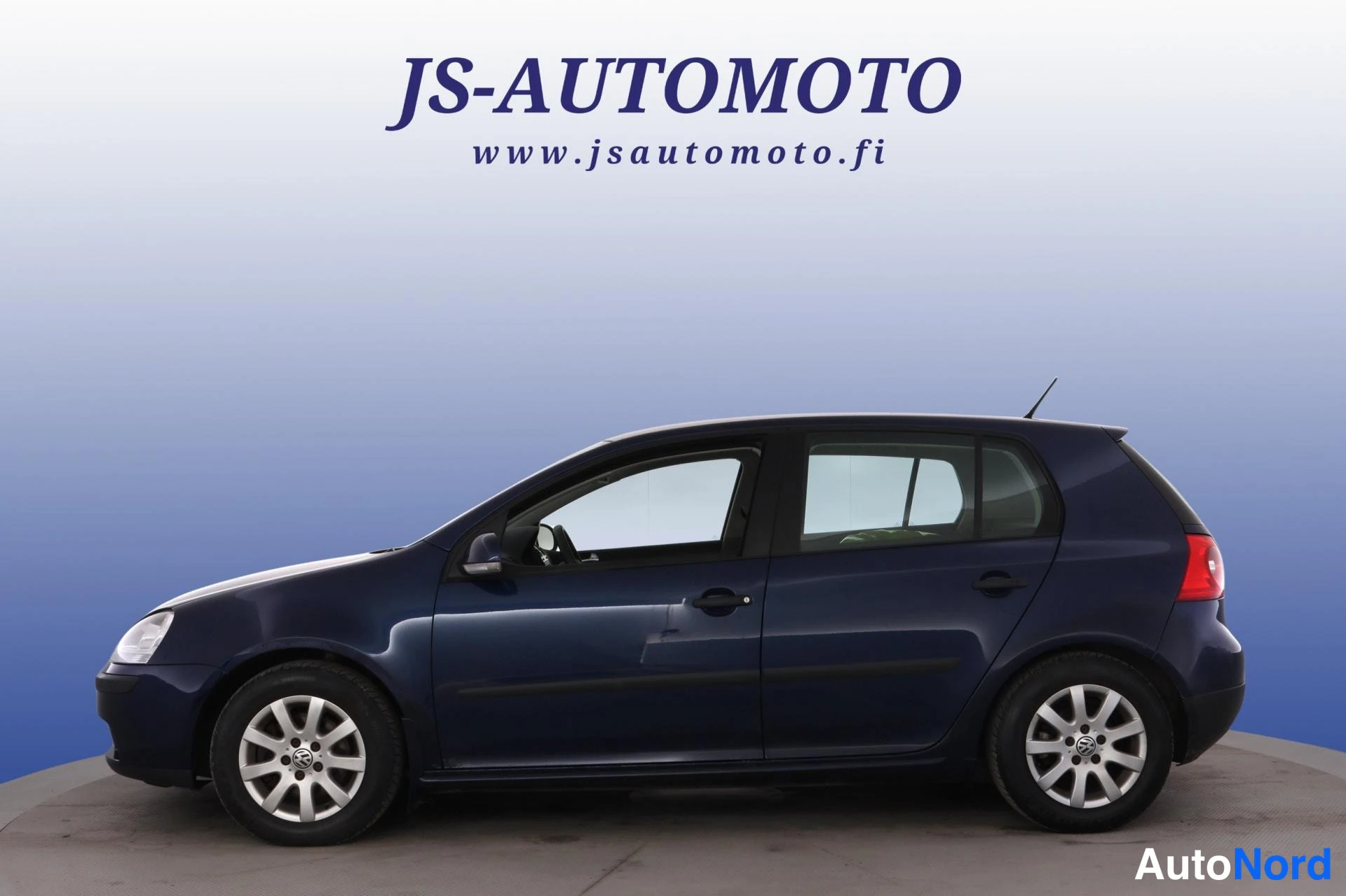 Blå Volkswagen Golf 2009, snett framifrån, fronten åt vänster, bild 2