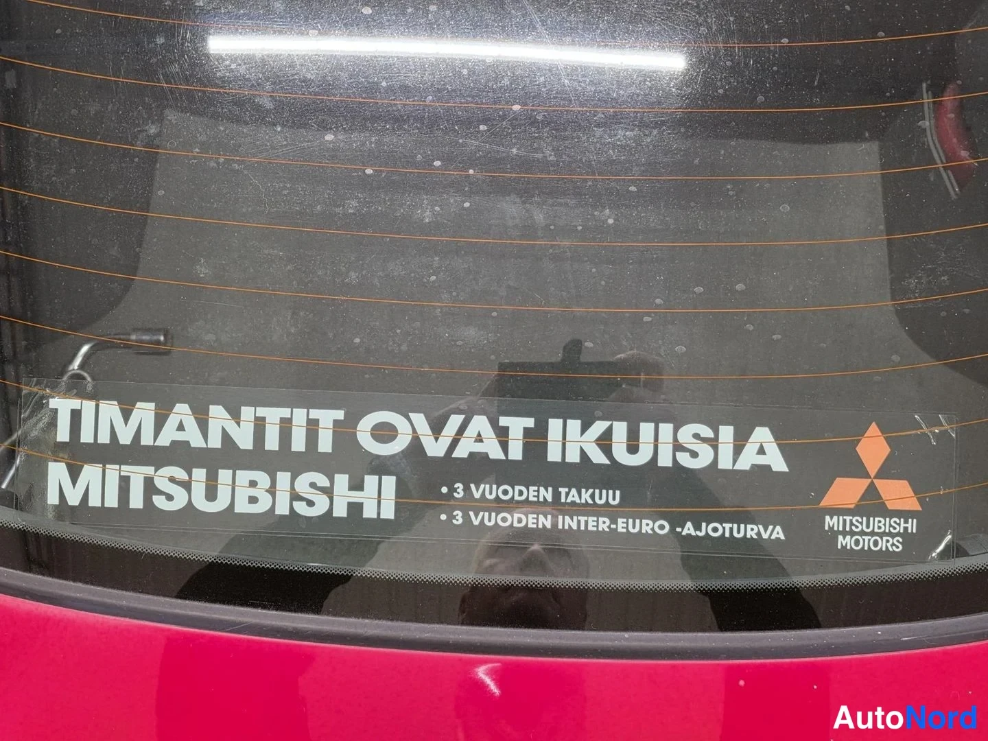 Röd Mitsubishi Carisma 1997, detalj, bild 20