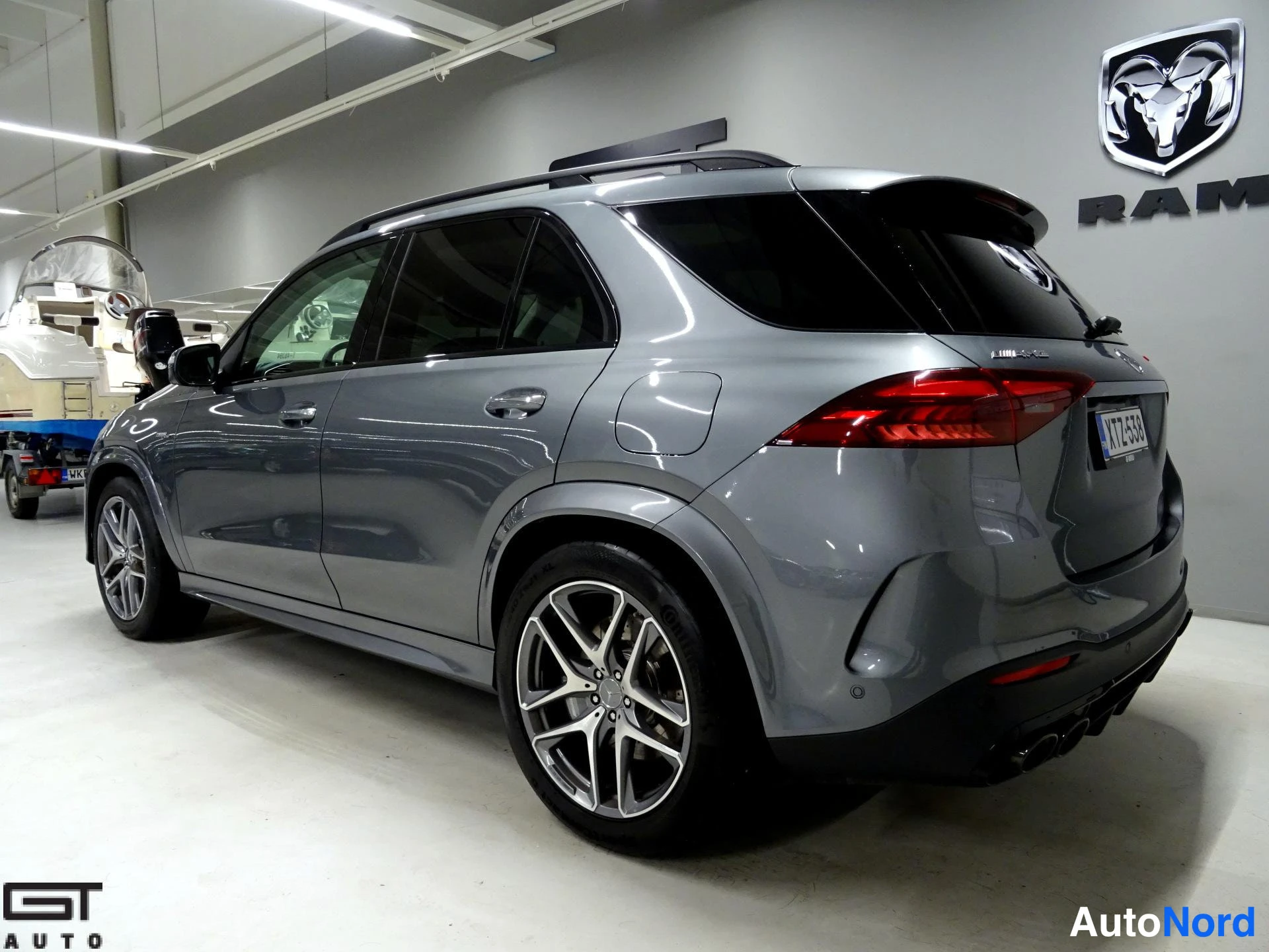 Grey Mercedes-Benz GLE 53 2024, rear three-quarter, photo 9