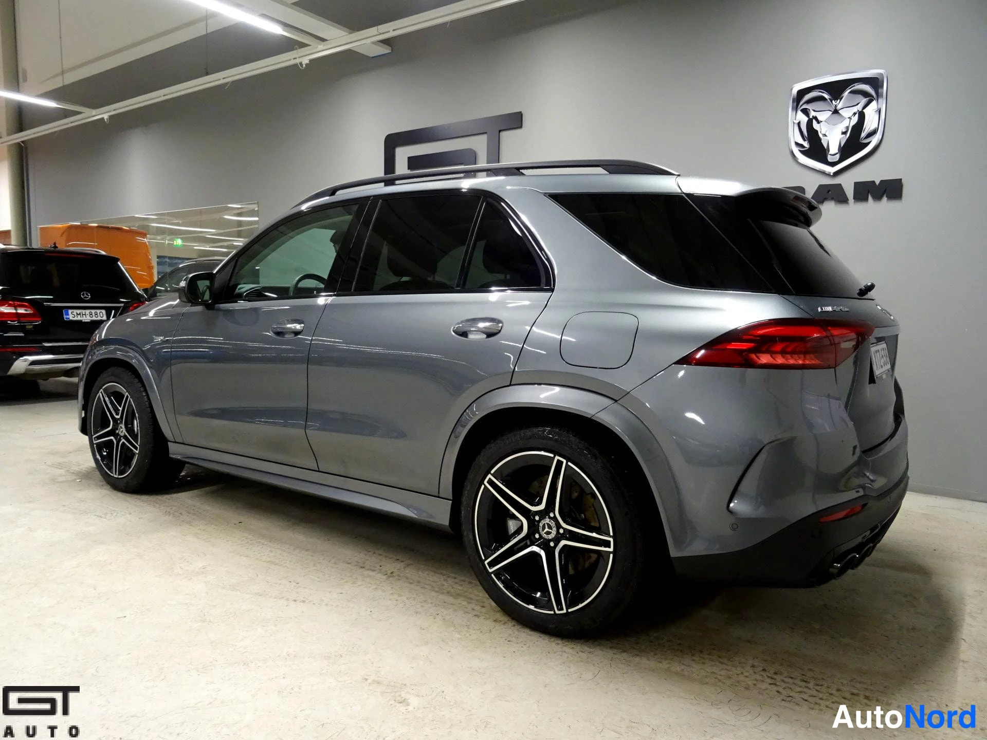 Grey Mercedes-Benz GLE 53 2024, rear three-quarter, photo 10