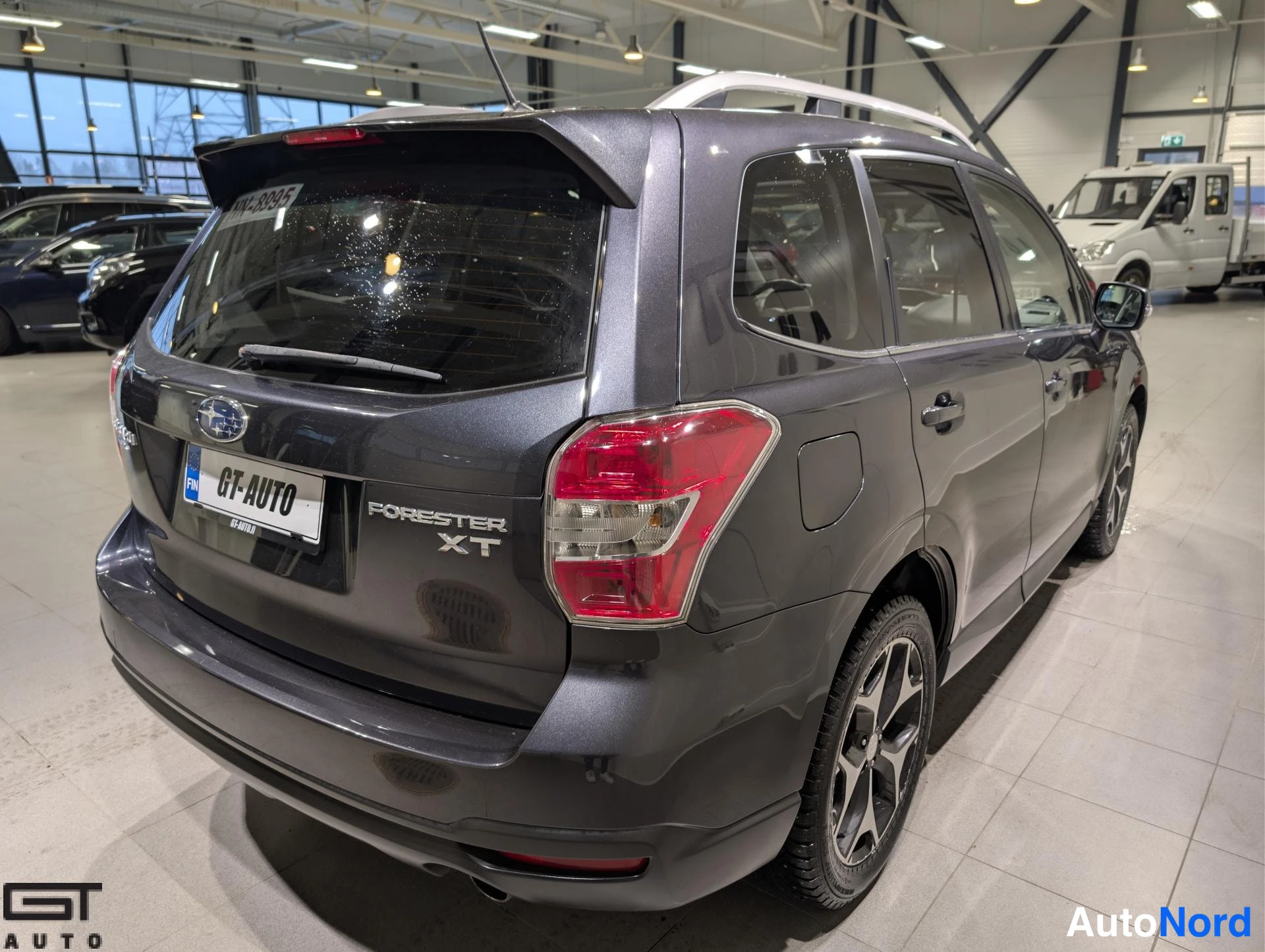 Harmaa Subaru Forester 2013, takaviisto, kuva 7
