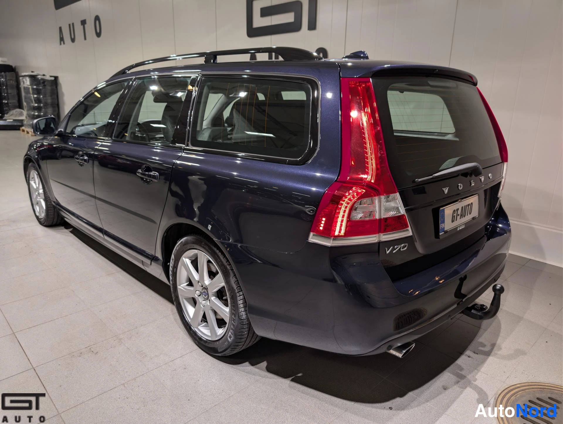Sininen Volvo V70 2016, takaviisto, kuva 7