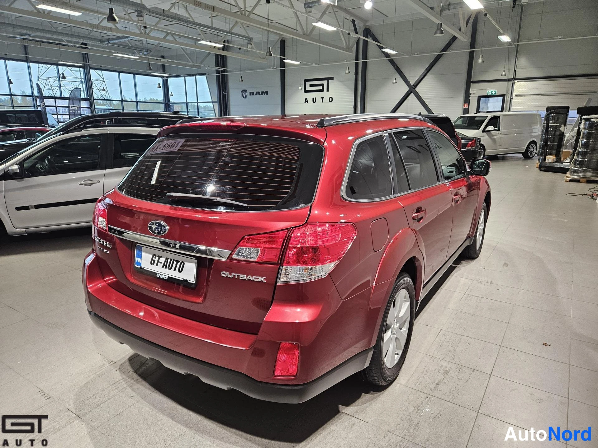 Red Subaru Outback 2013, rear three-quarter, photo 6