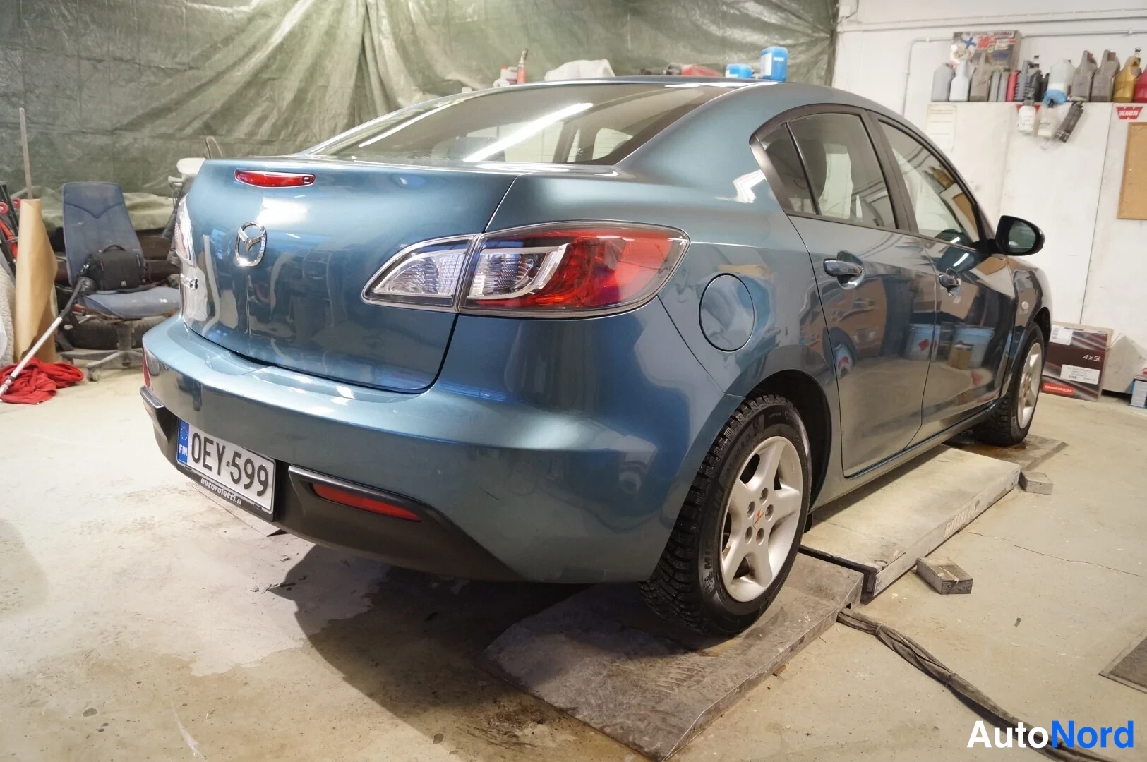 Sininen Mazda 3 2010, takaviisto, kuva 3