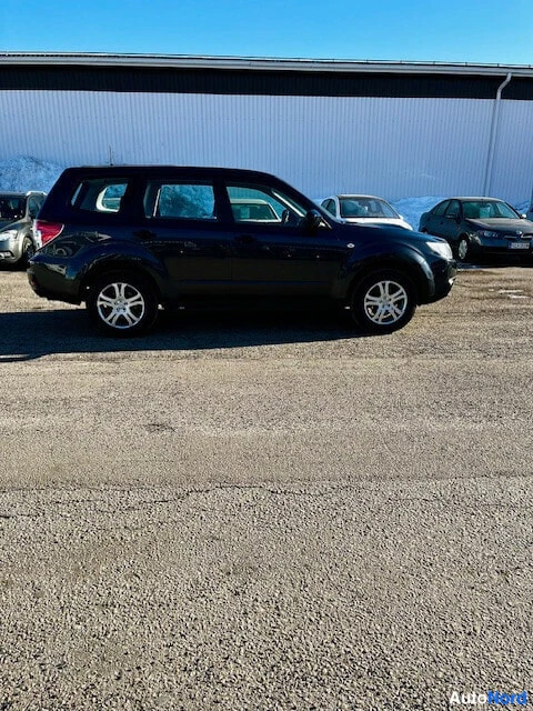 Blue Subaru Forester 2012, rear three-quarter, photo 7