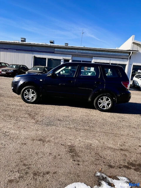 Blue Subaru Forester 2012, side, photo 4