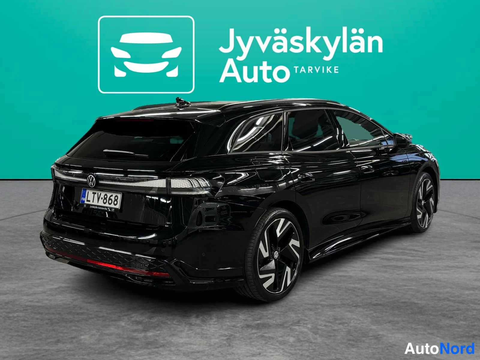 Musta Volkswagen ID.7 2026, takaviisto, kuva 6