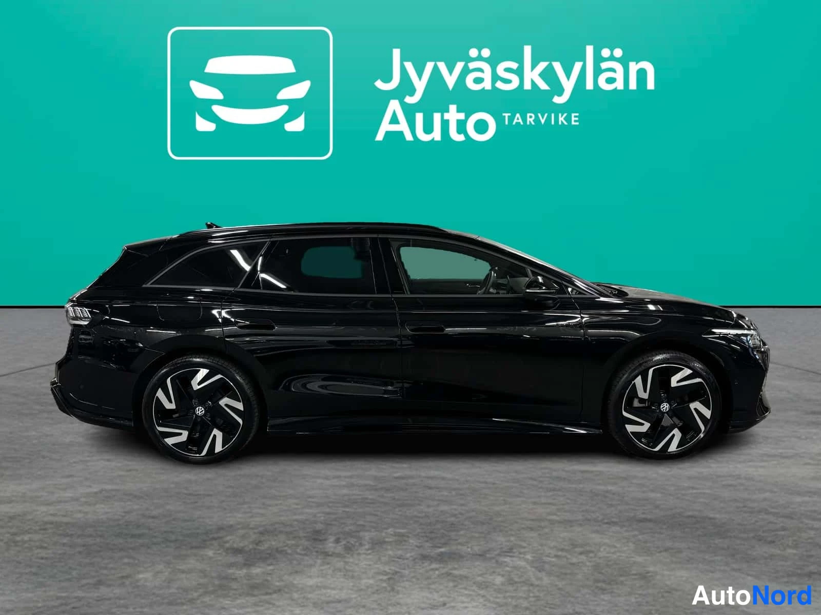 Musta Volkswagen ID.7 2026, sivulta, kuva 5