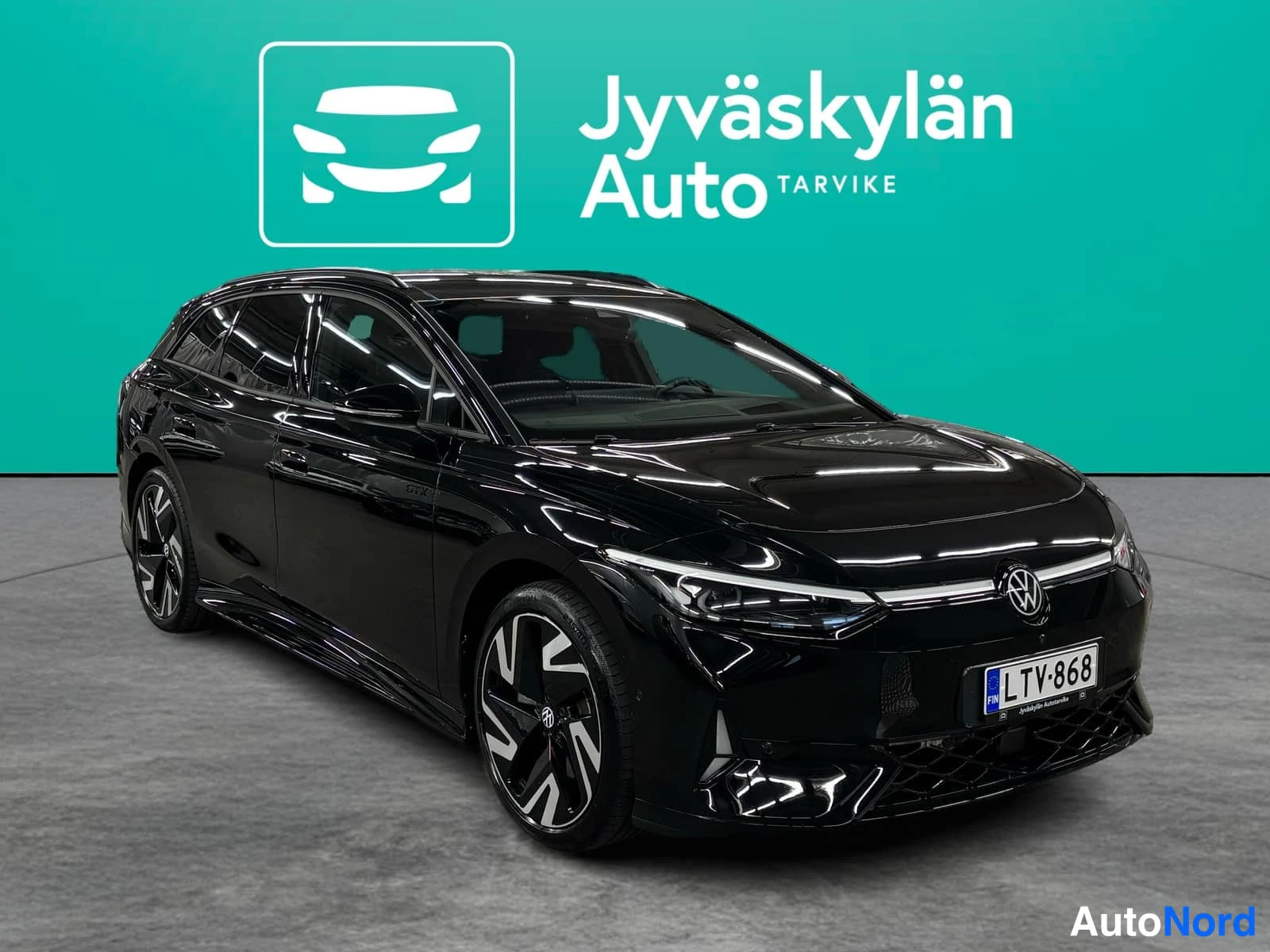 Musta Volkswagen ID.7 2026, etuviisto, keula oikealle, kuva 3