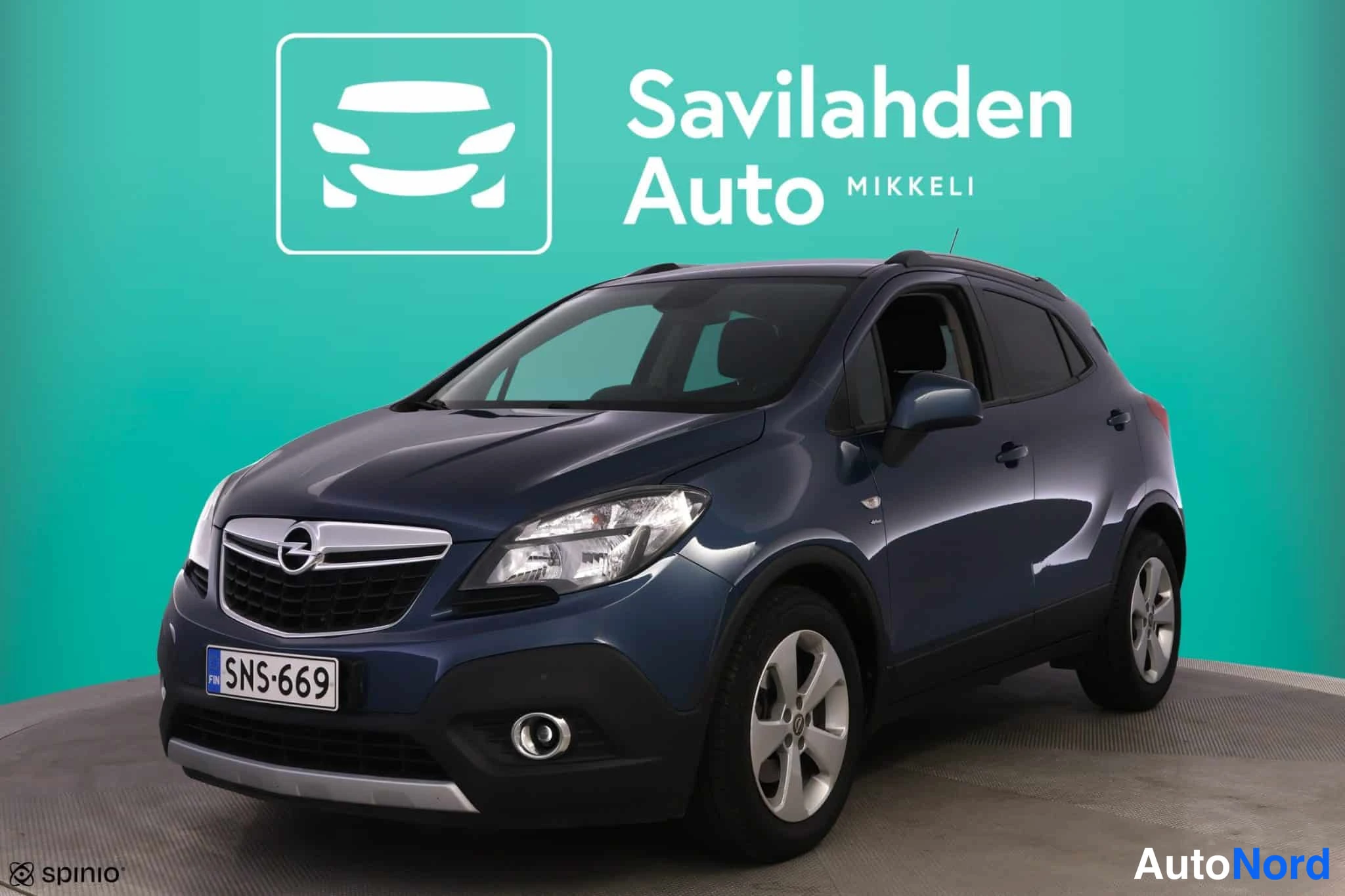 Sininen Opel Mokka 2016, etuviisto, keula vasemmalle, kuva 2