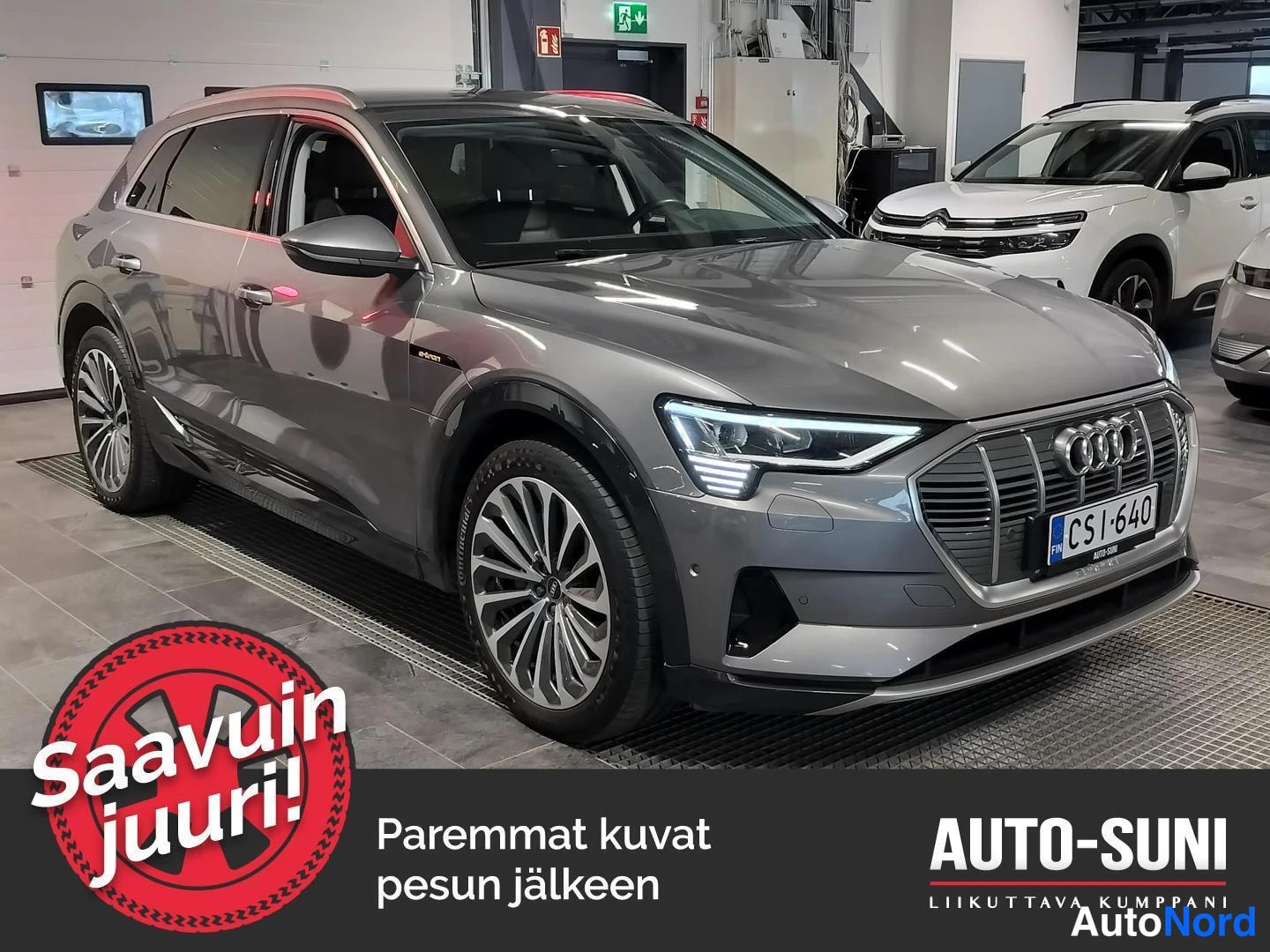 Grey Audi e-tron 2021, front three-quarter, nose to the right, photo 2