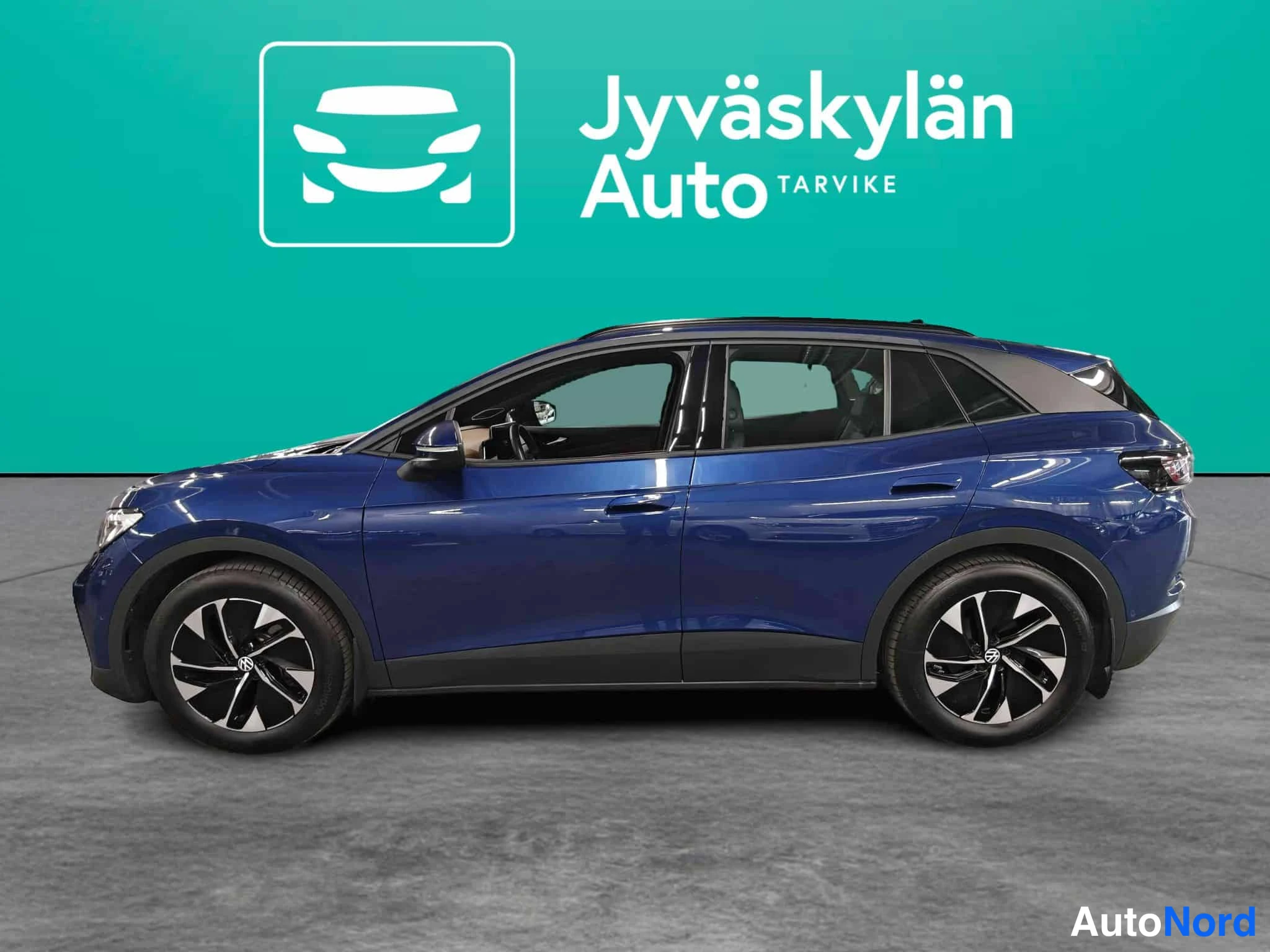Sininen Volkswagen ID.4 2025, etuviisto, keula vasemmalle, kuva 3
