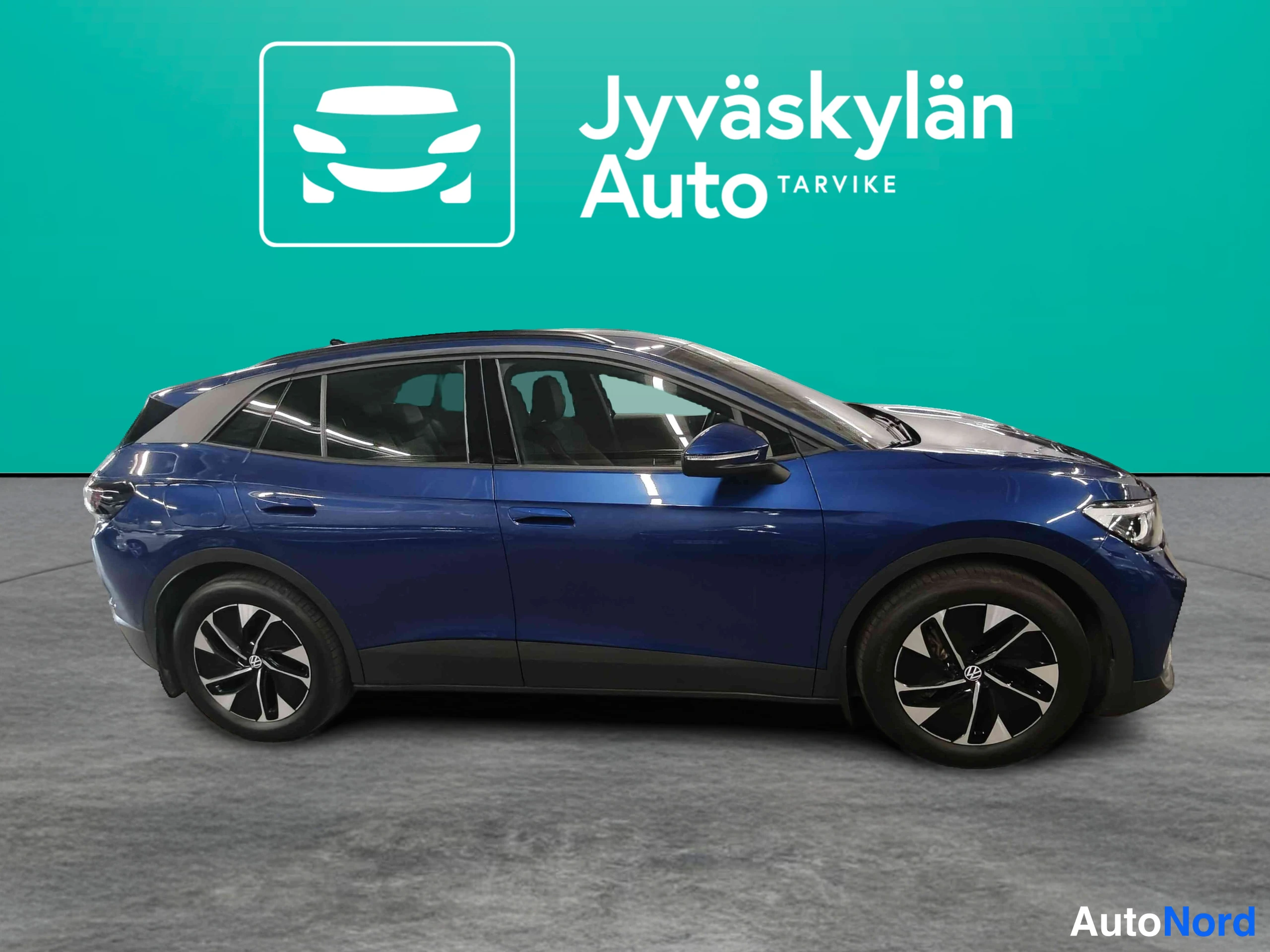Sininen Volkswagen ID.4 2025, etuviisto, keula oikealle, kuva 8