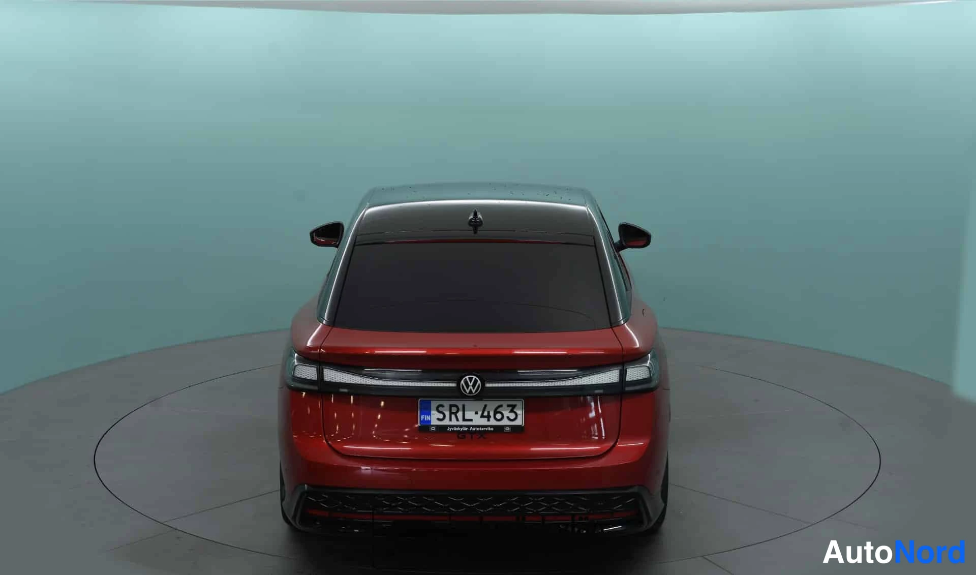 Punainen Volkswagen ID.7 2025, takaa, kuva 12